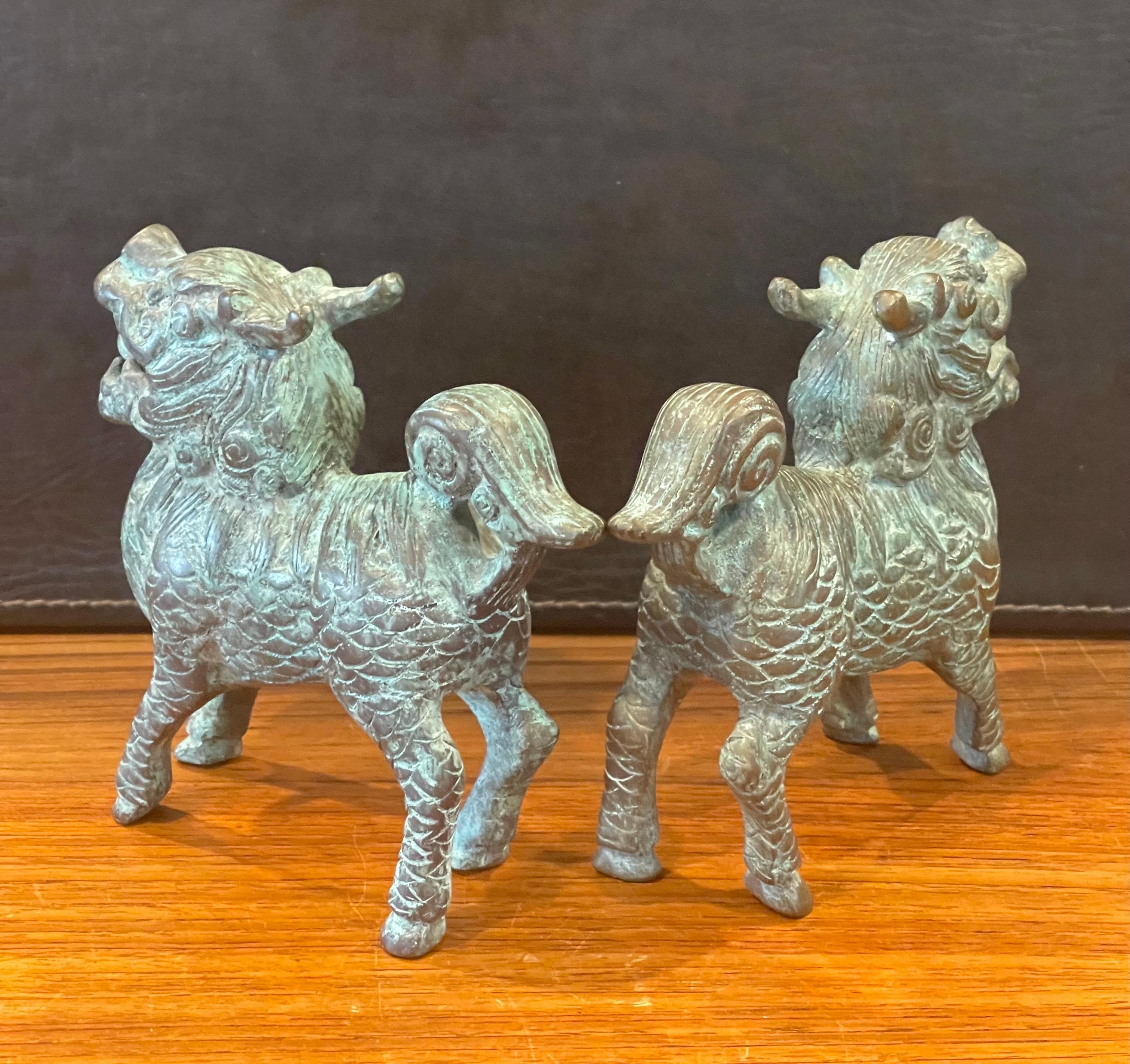Pair of Patinated Bronze Chinese Foo Dogs with Verdigris Finish For Sale 2