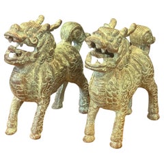 Pair of Patinated Bronze Chinese Foo Dogs with Verdigris Finish
