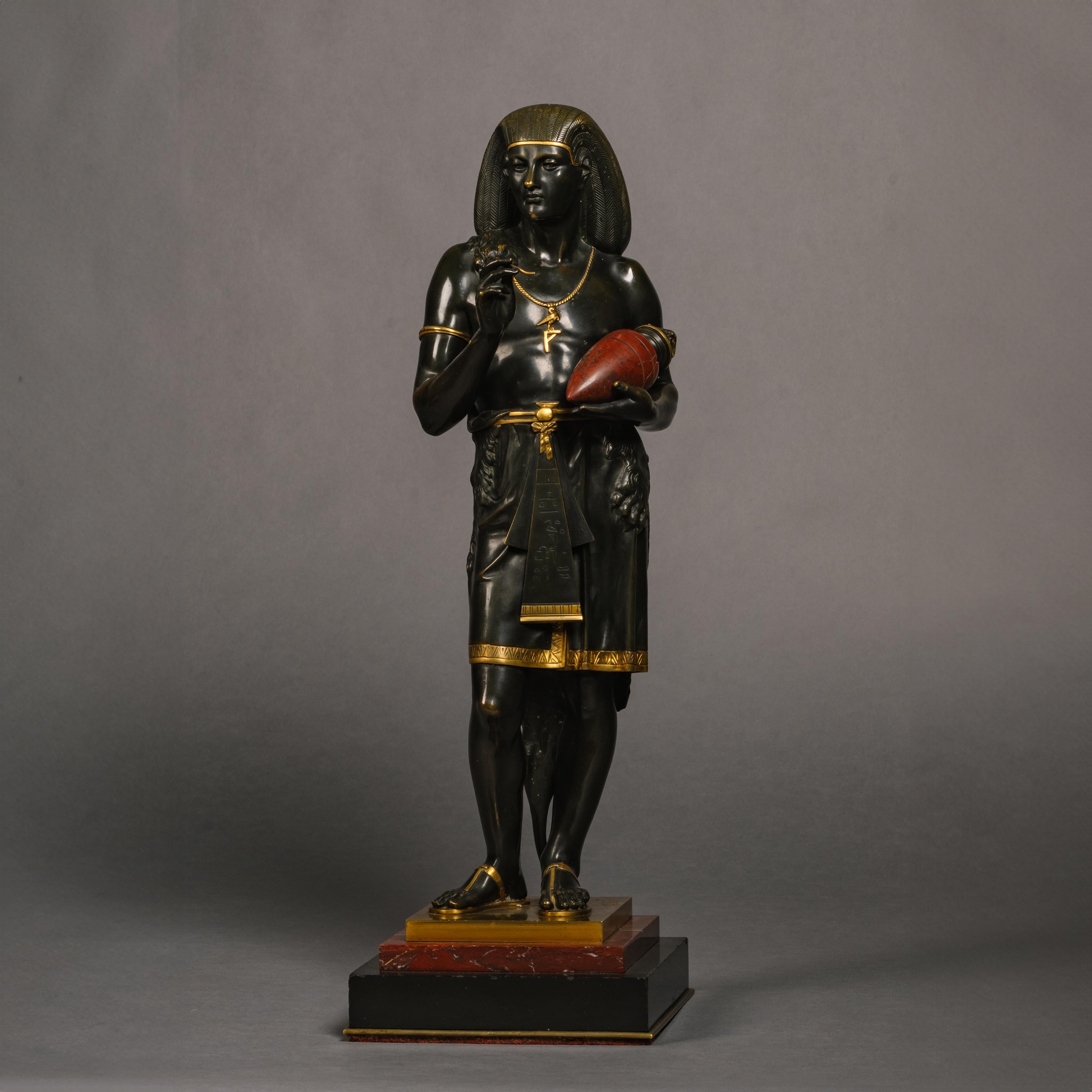 Patiné Paire de figures égyptiennes en bronze patiné d'Emile Louis Picault  en vente