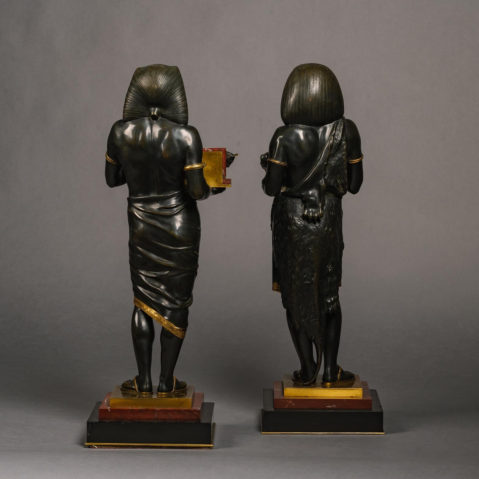 19th Century Pair of Patinated Bronze Egyptian Figures by Emile Louis Picault  For Sale