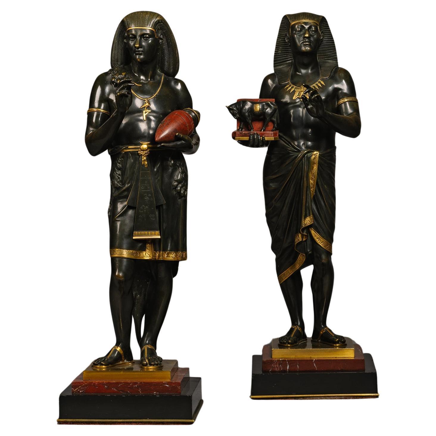 Pair of Patinated Bronze Egyptian Figures by Emile Louis Picault  For Sale