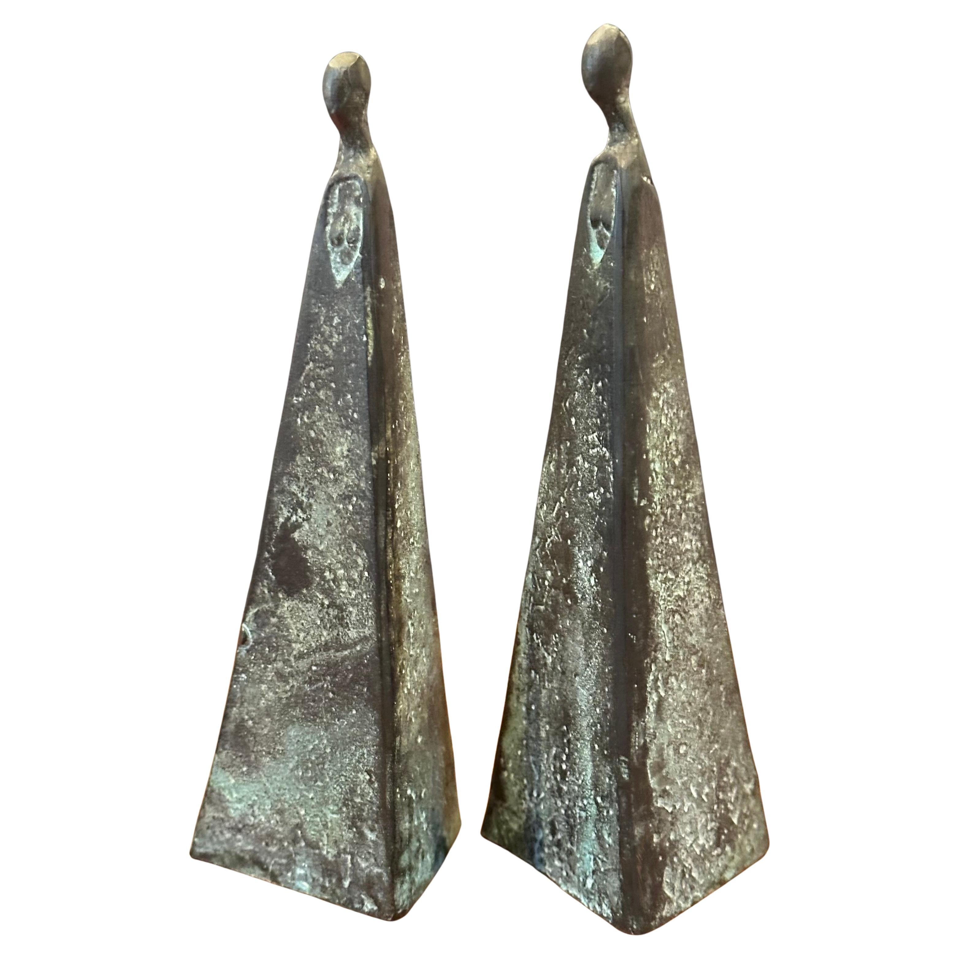 A super cool pair of patinated bronze figurative sculptures in the style of renowned South African sculptor/ artist Sydney Kumalo, circa 1960s. The minimalist and modern complementing female figures have a wonderful vintage patina and  measure 3