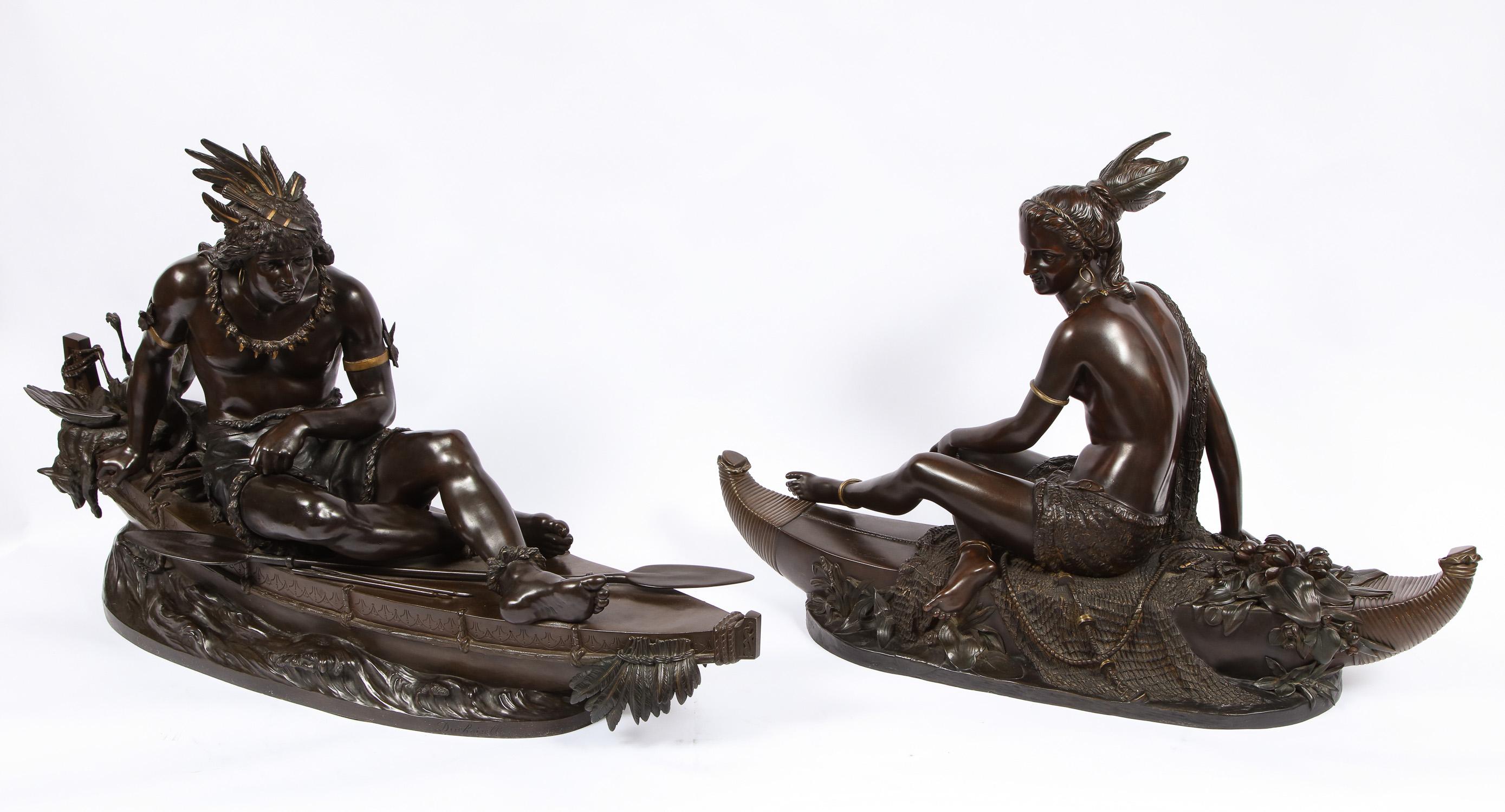 A magnificent and monumental pair of patinated bronze figures depicting native Americans, La Peche and La Chasse. Known as the 