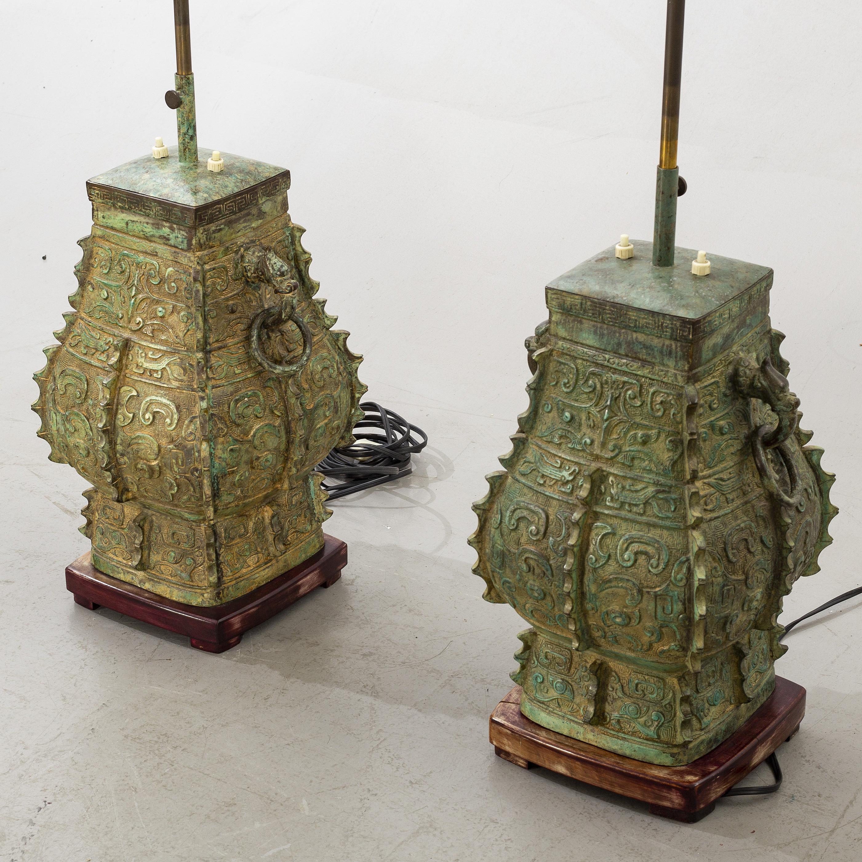 Very rare pair of Bronze lamps patinated 