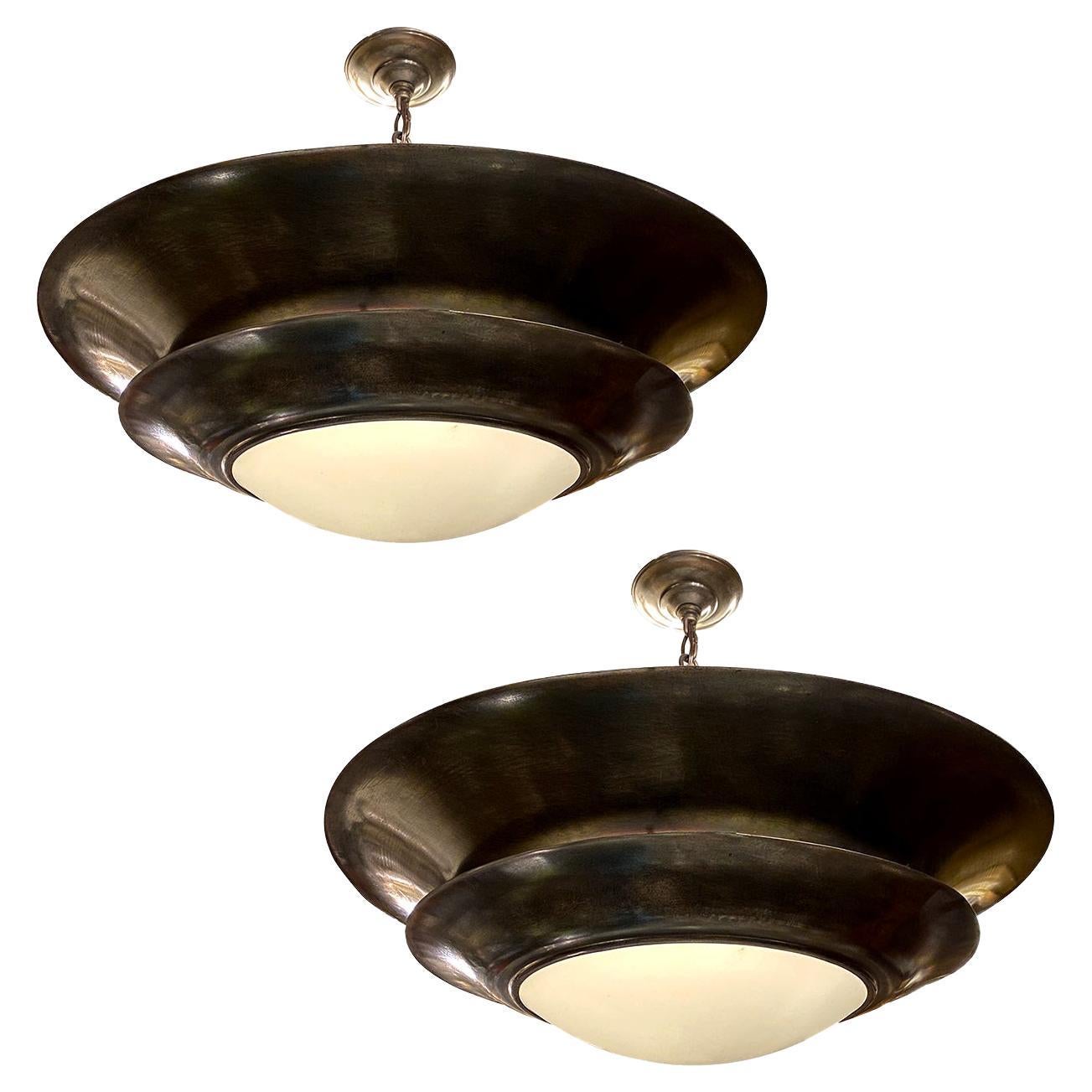 Pair of Patinated Bronze Light Fixtures, Sold Individually