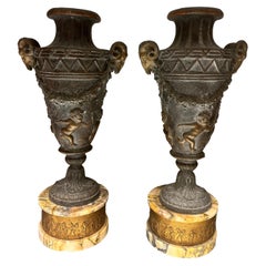 Pair of Patinated Bronze or Metal Bacchanalian Vases with Marble base