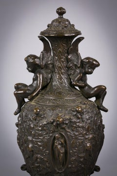 Pair of Patinated Bronze Renaissance Style Covered Urns, circa 1875