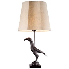 Pair of Patinated Bronze Table Lamps Representing a Falcon.