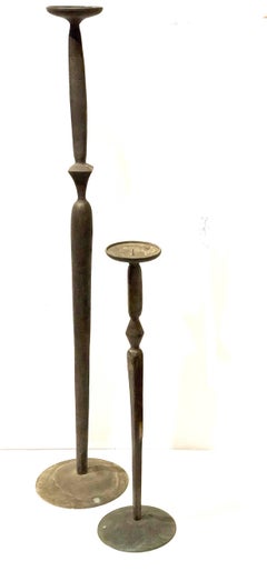 Pair of Patinated Cast Bronze Giacometti Style Tall and Short Candleholders