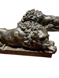 Pair of patinated cast-iron lions, Grand Tour souvenir – Italy - 19th century