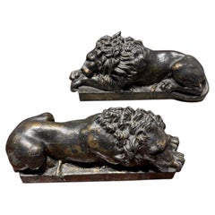 Pair of patinated cast-iron lions, Grand Tour souvenir – Italy - 19th century