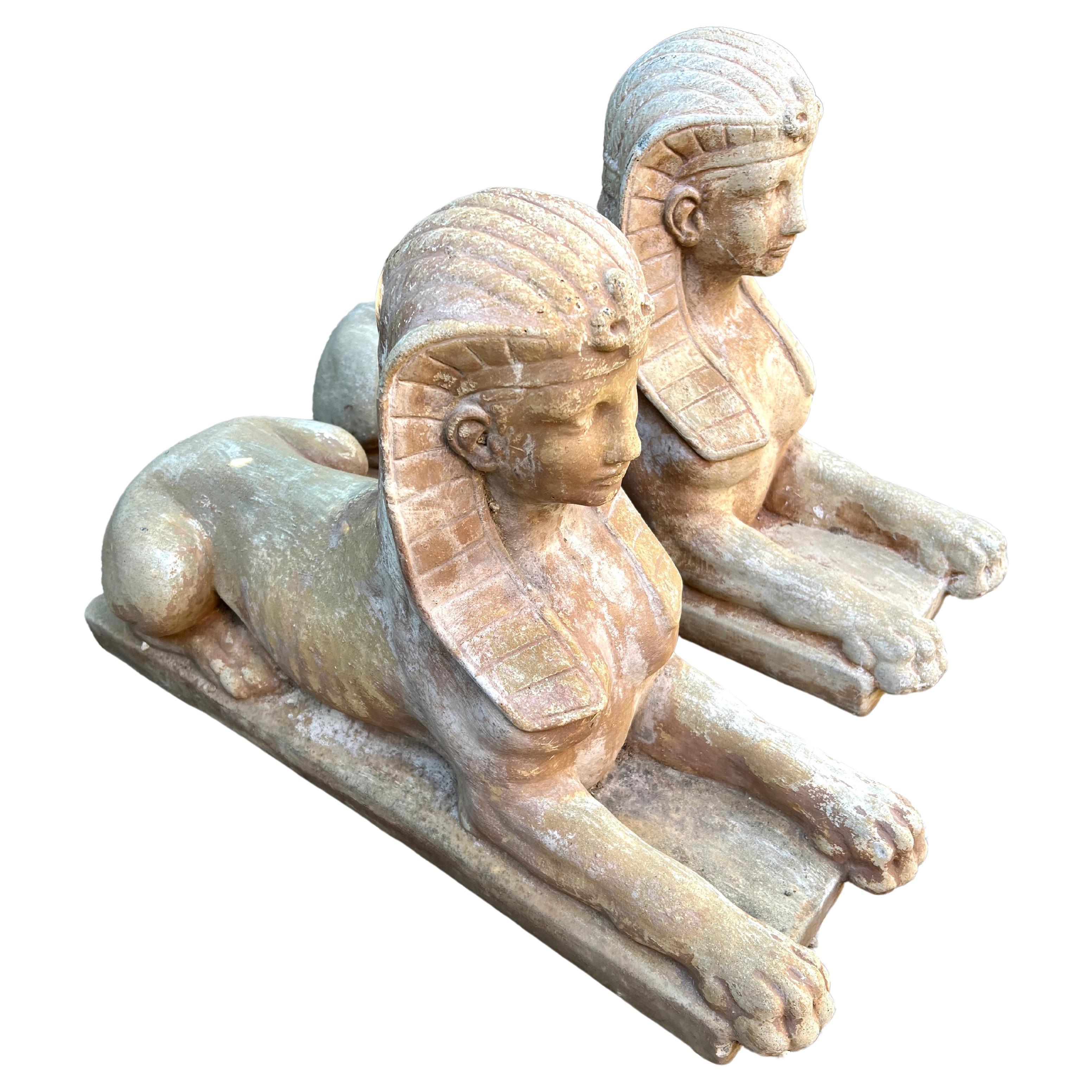 Pair of Patinated Cast Stone Sphinx Garden Sculptures