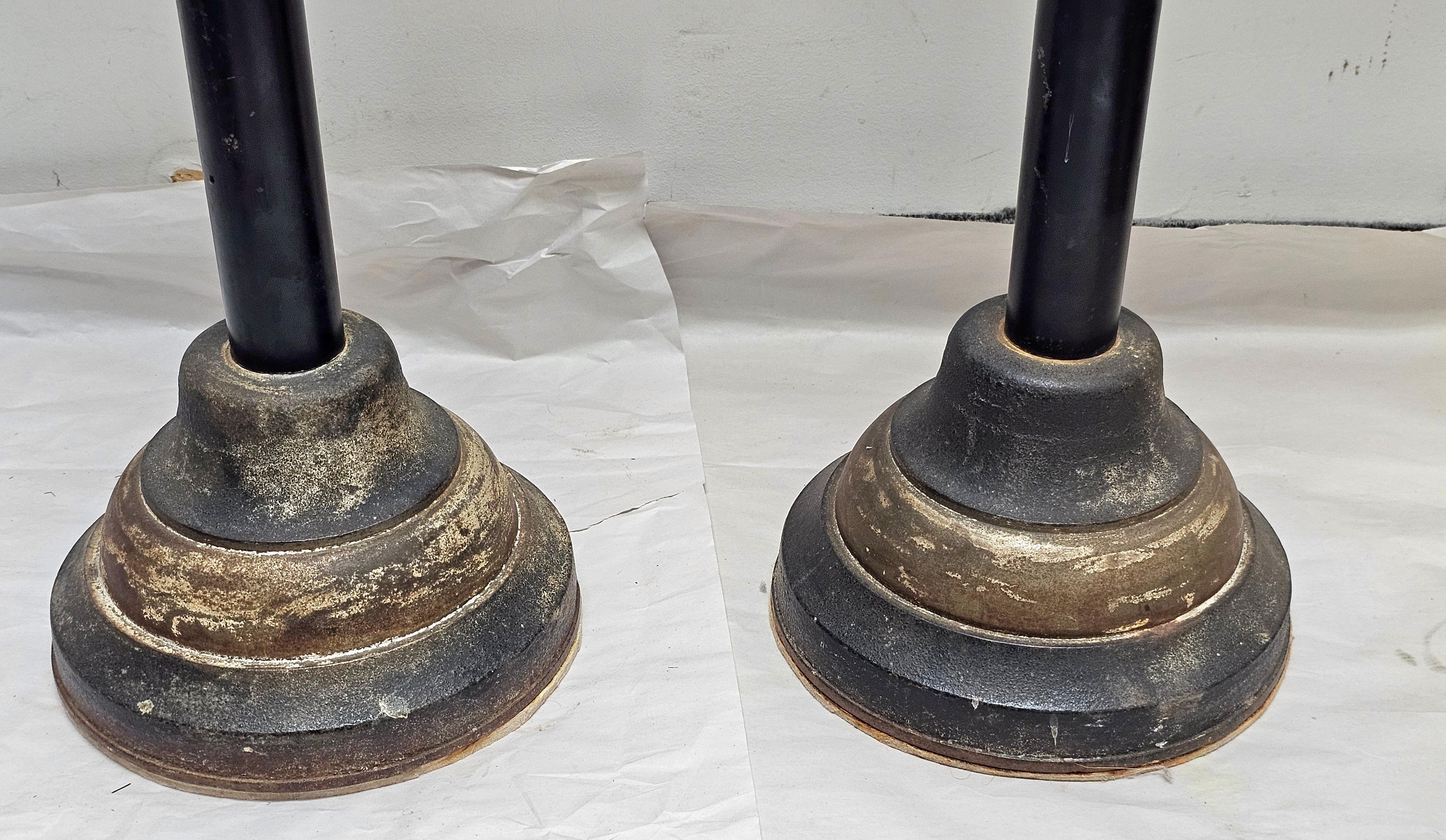 American Pair of  Patinated Iron and Ebonized Metal PricketsCandleholders Torcheres For Sale