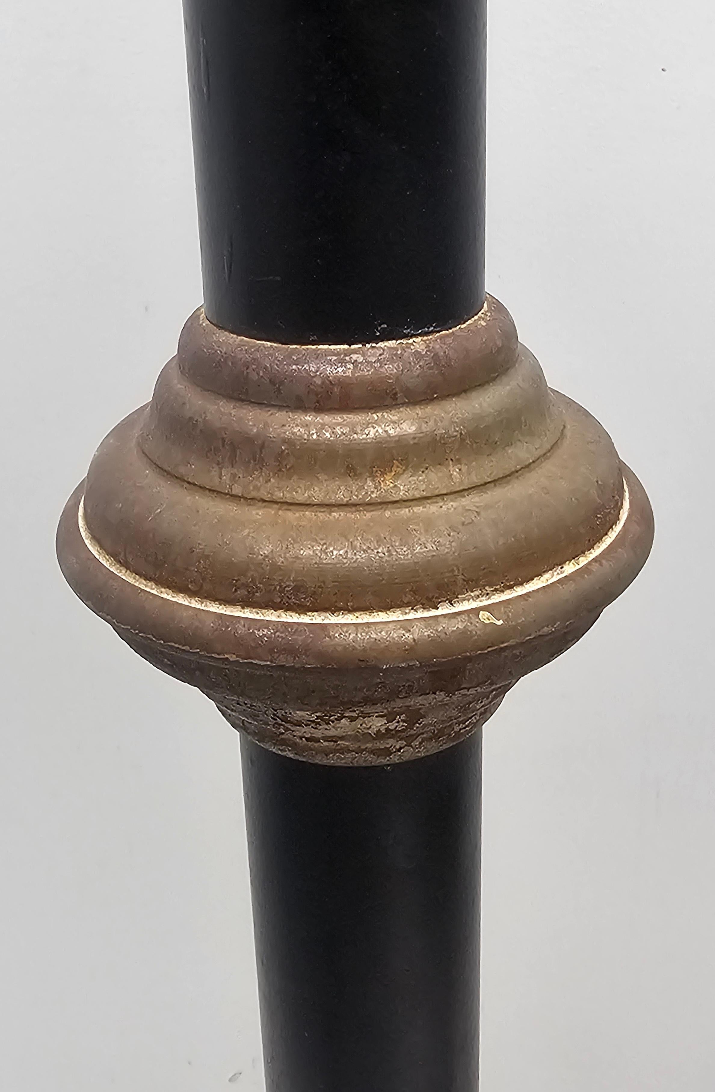 20th Century Pair of  Patinated Iron and Ebonized Metal PricketsCandleholders Torcheres For Sale