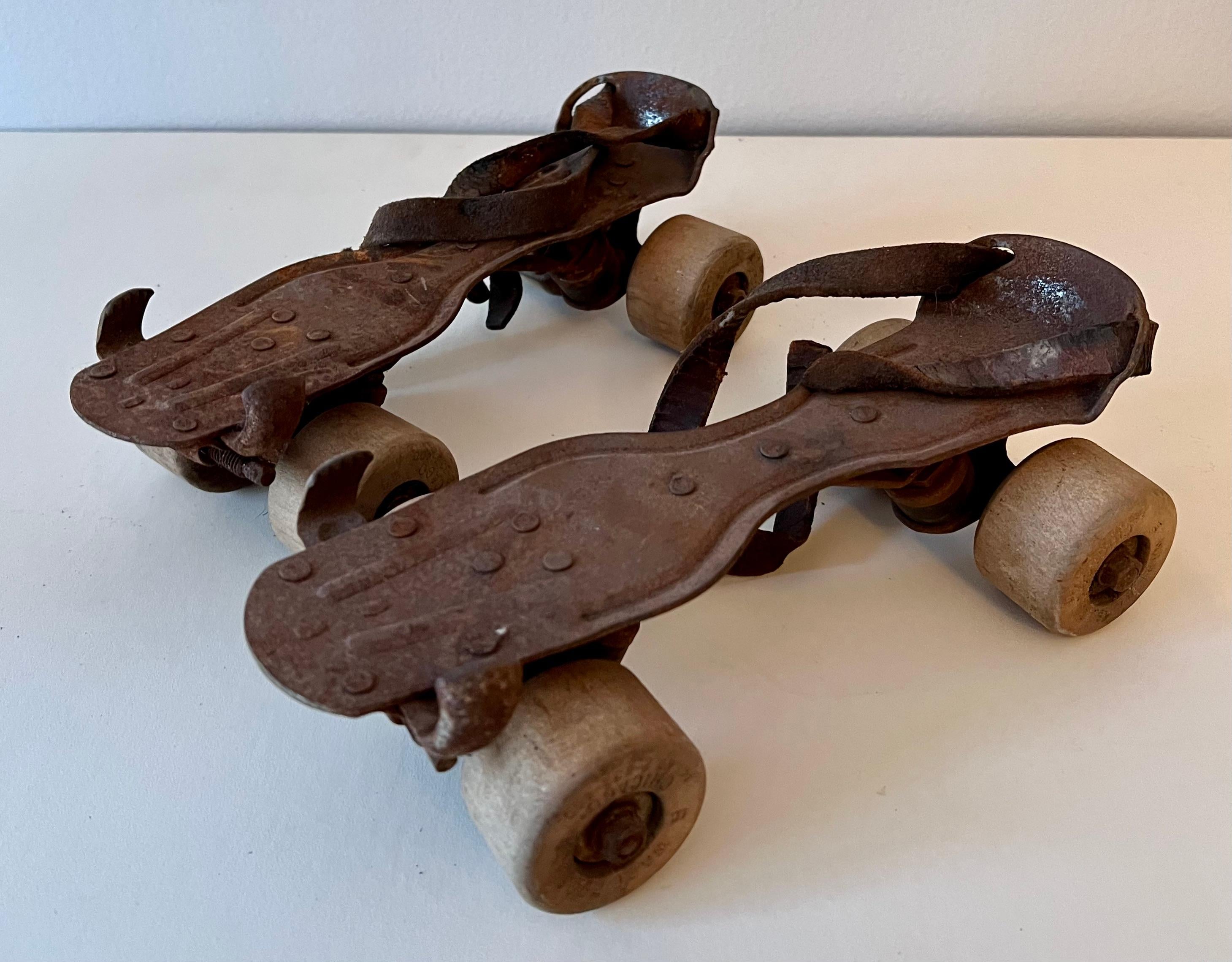 A pair of roller skates, made famous in the movie THE SEVEN YEAR ITCH... when Tom Ewel falls over them twice (not the actual skate props from the movie)... 

The pair are heavily patinated and make a great decorative addition to many settings,