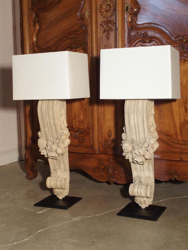 These fabulous French table lamps are in the shape of architecturals called corbels. They are made from a cast Terra Cotta and are patinated to look exactly like the color of stone. These lamps will be an asset to room they are placed in. We have