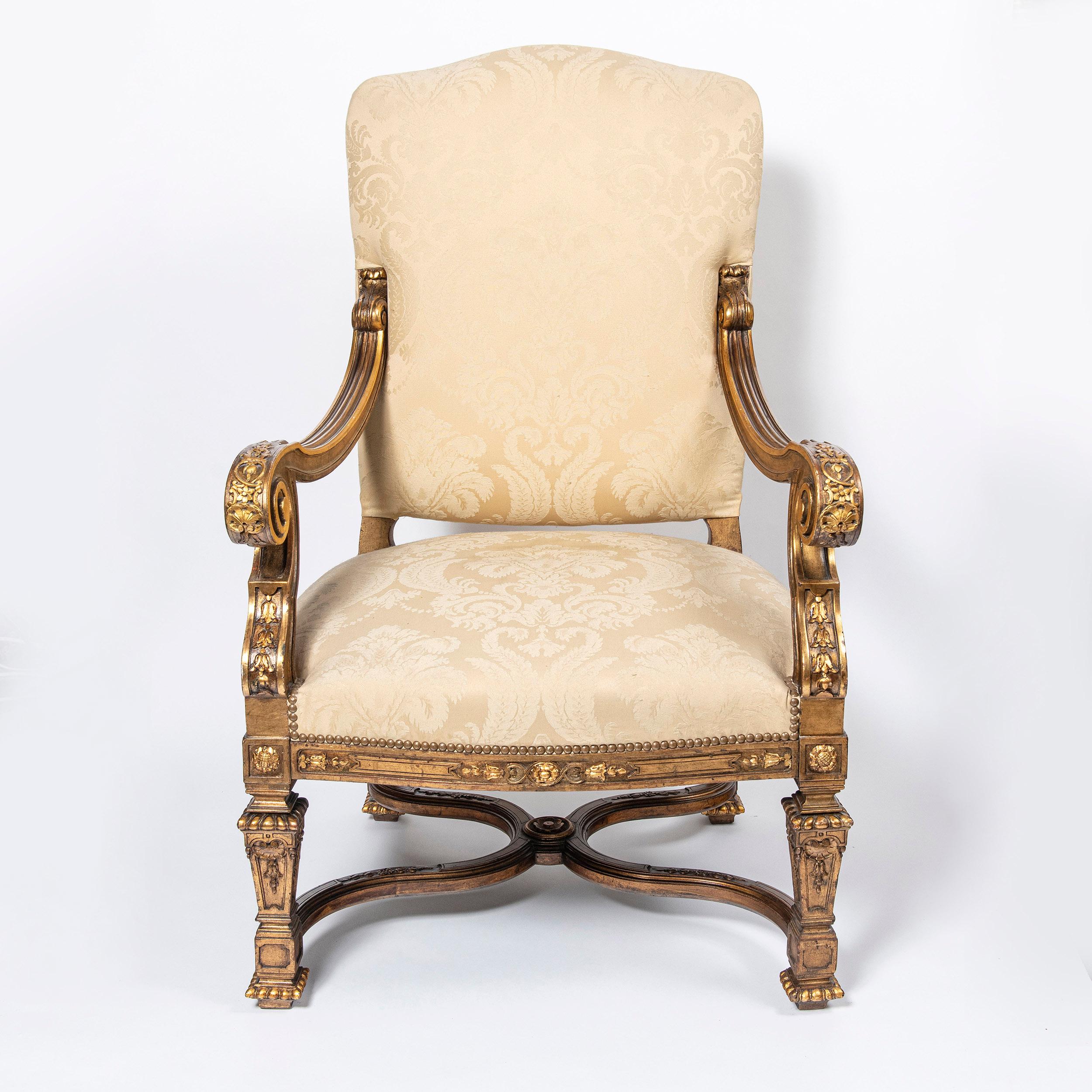 Pair of wood and gold leaf armchairs by Maison Forest, France, late 19th century.