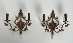Pair of Patinated Wrought Iron Wall Sconces with Gilded Acanthus Leaves and Crys