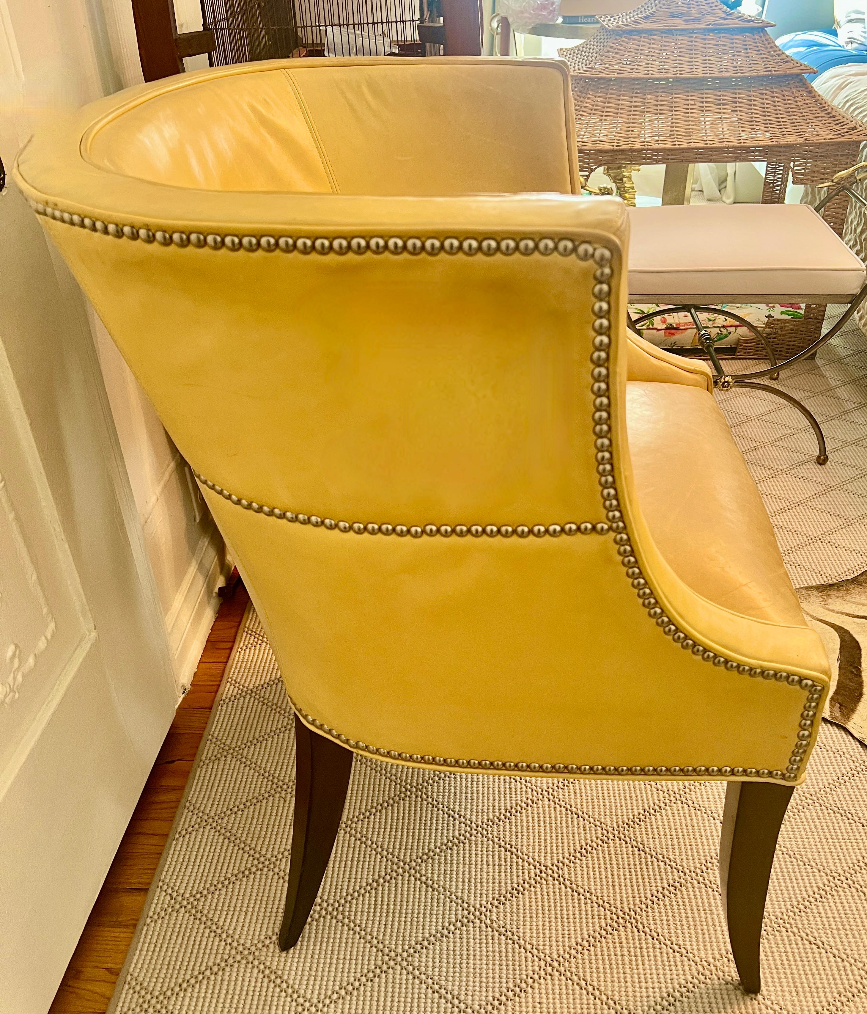 Pair of Patinated Yellow Leather Club Barrel Style Chairs with Nailheads In Good Condition For Sale In Los Angeles, CA