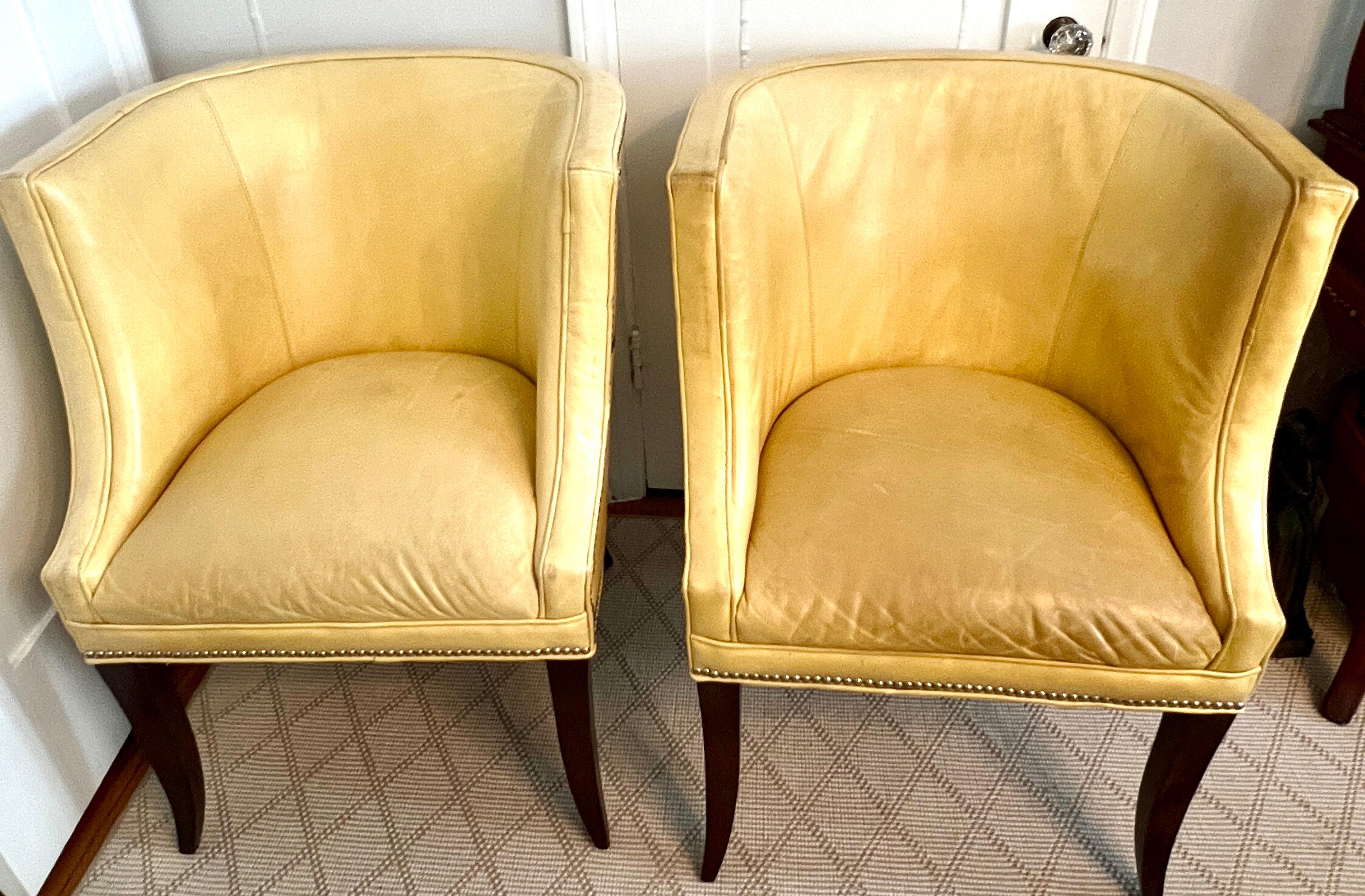 20th Century Pair of Patinated Yellow Leather Club Barrel Style Chairs with Nailheads For Sale