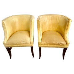 Pair of Patinated Yellow Leather Club Barrel Style Chairs with Nailheads
