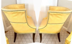 Pair of Patinated Yellow Leather Club Barrel Style Chairs with Nailheads