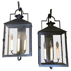 Pair of Paul Ferrante Antiqued Glass and Iron Baxley Lanterns