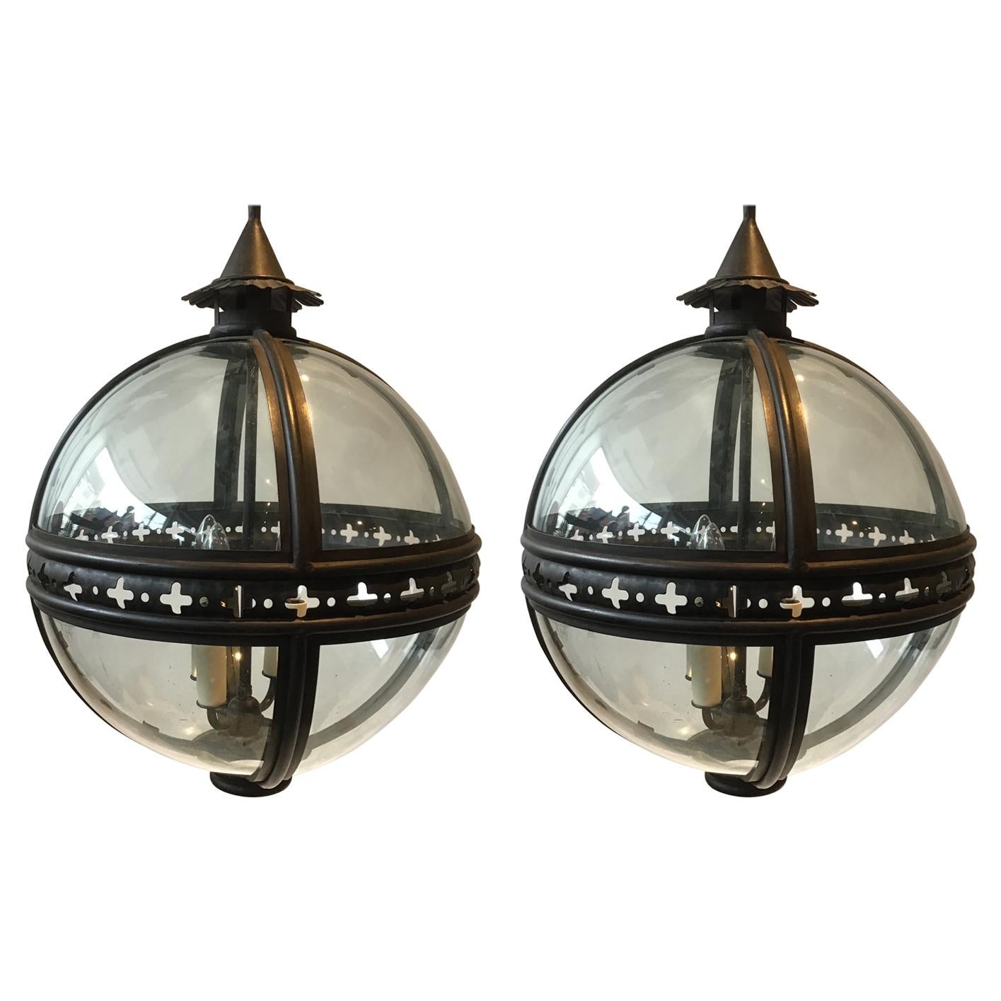 Pair of Paul Ferrante Iron and Glass Orb Chandeliers