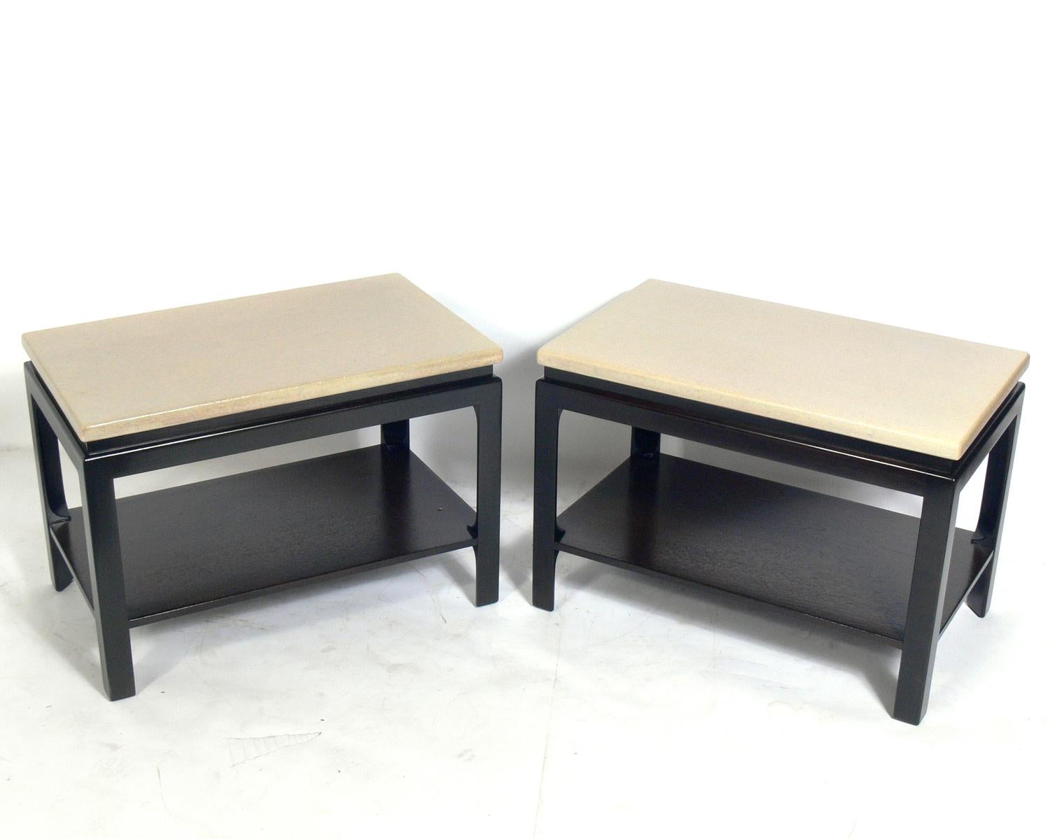 Pair of cork top end tables, designed by Paul Frankl for Johnson Furniture, American, circa 1940s. The clean lined form of these tables exhibit the Asian influences seen in many of Frankl's designs from this period. They have been refinished in