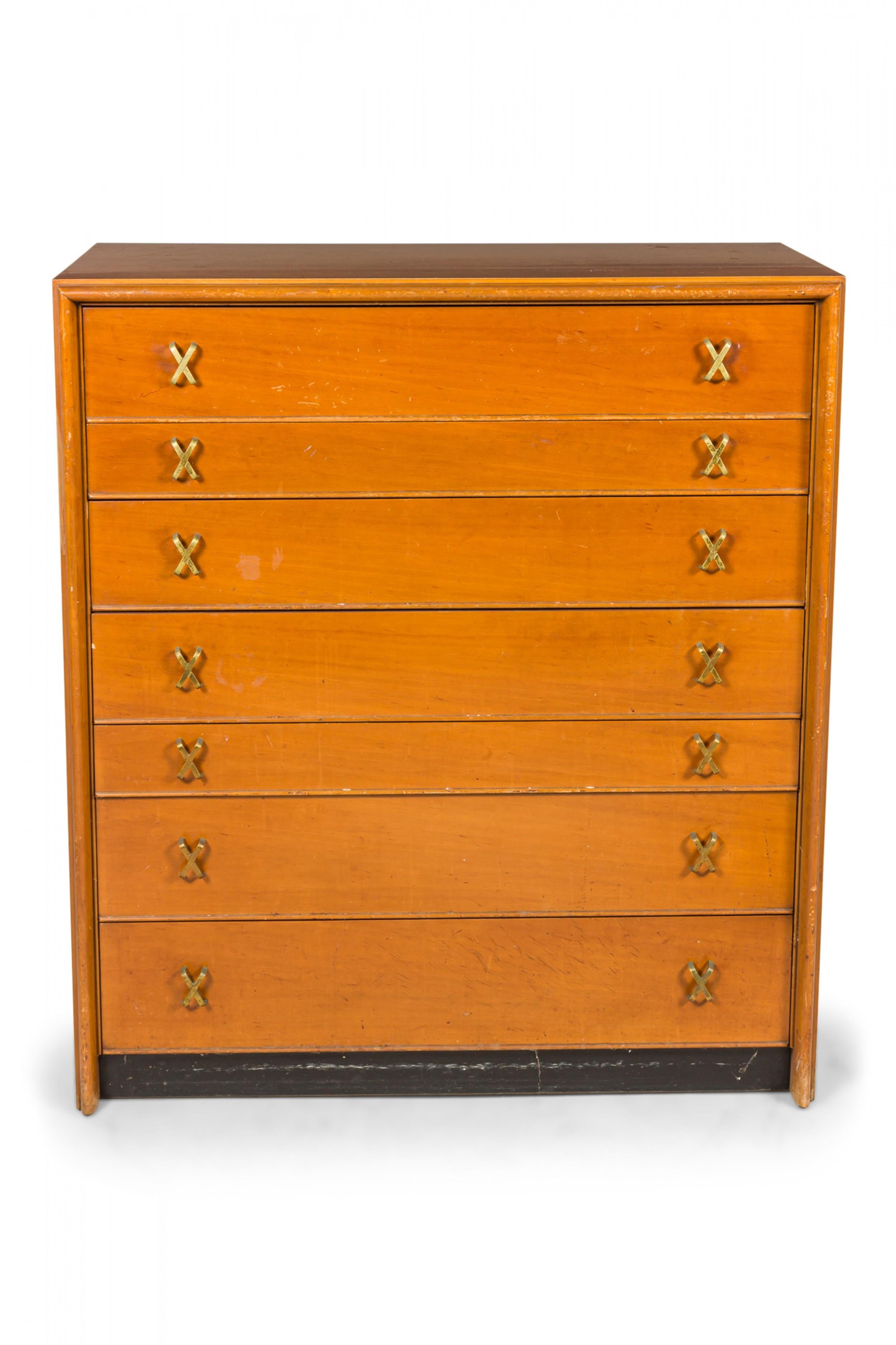 Pair of mid-century walnut high chests / dressers with six drawers mounted with X-shaped brass drawer pulls. (Paul Frankl For Johnson Furniture Co)(priced as pair).