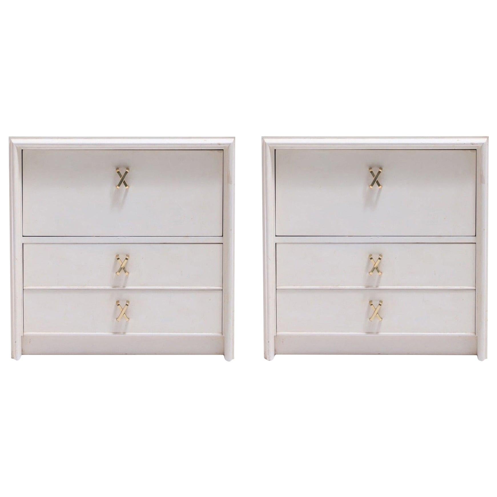 Pair of Paul Frankl Ivory Lacquered Nightstands with Brass X Pulls, circa 1950 For Sale