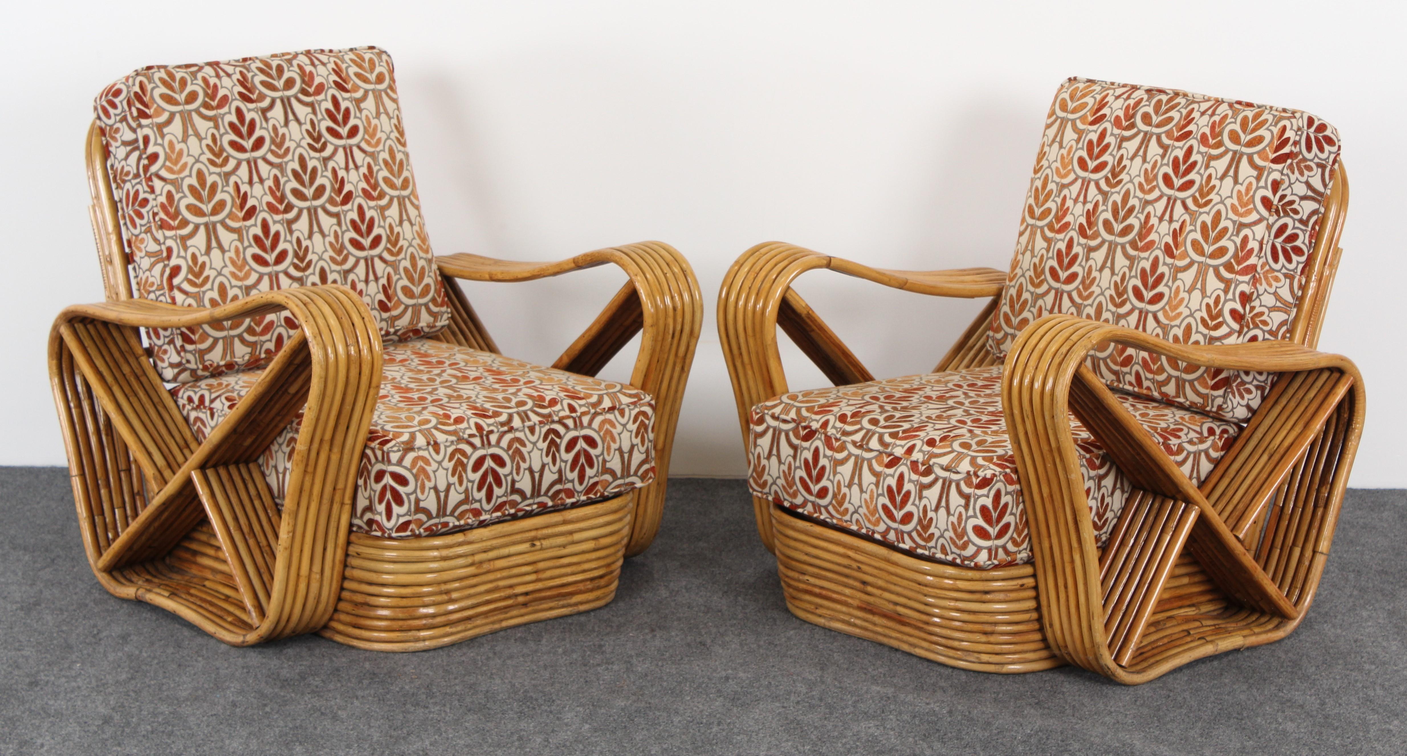 A pair of Paul Frankl style bamboo rattan lounge chairs, 1950s having six strand square pretzel rattan formation. Cushions included. Good condition with age appropriate wear.

     

          