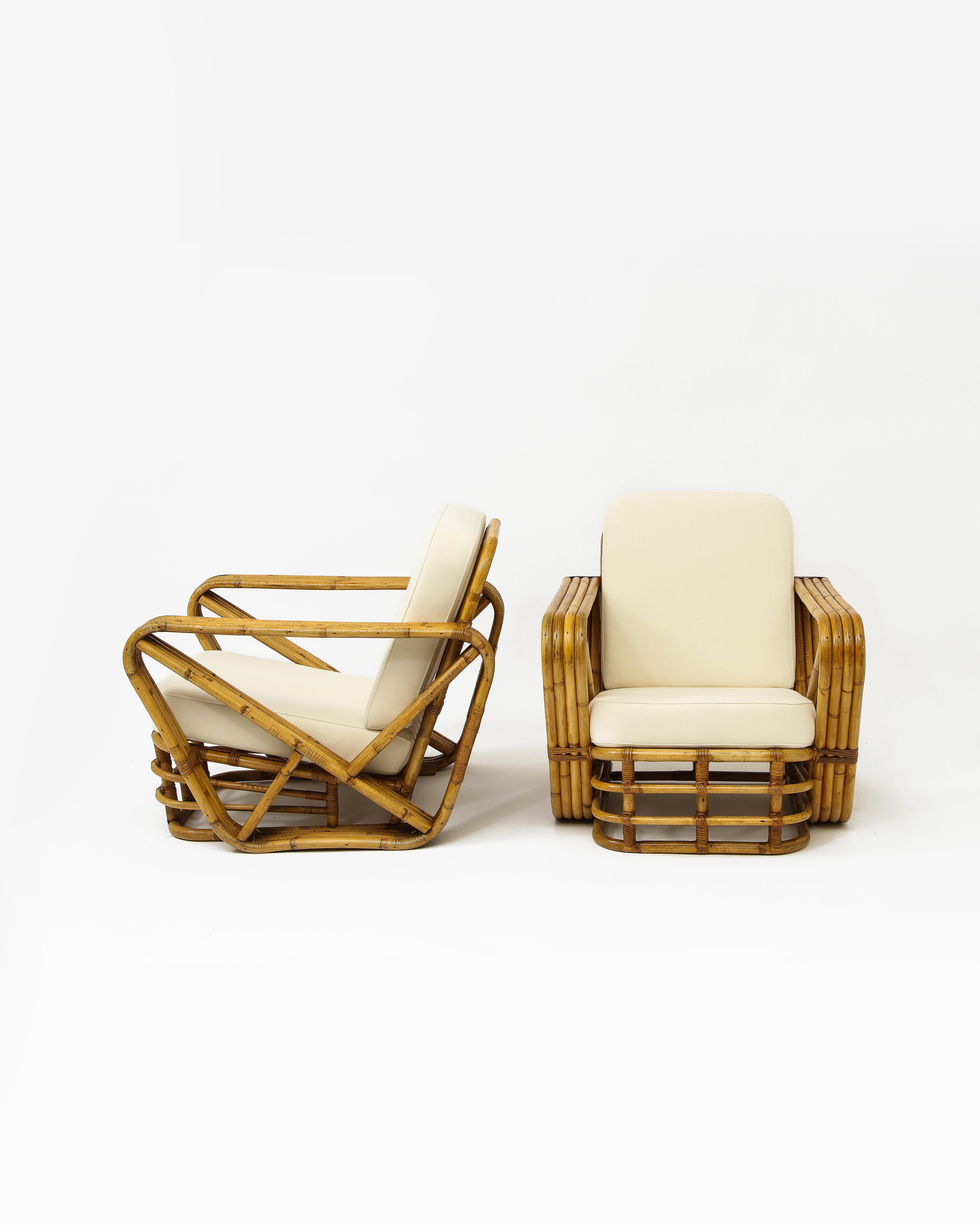 Four strand pretzel arm bamboo rattan lounge chairs with open base in the manner of Paul Frankl.

Arms are 4” wide. Arms slopping 21