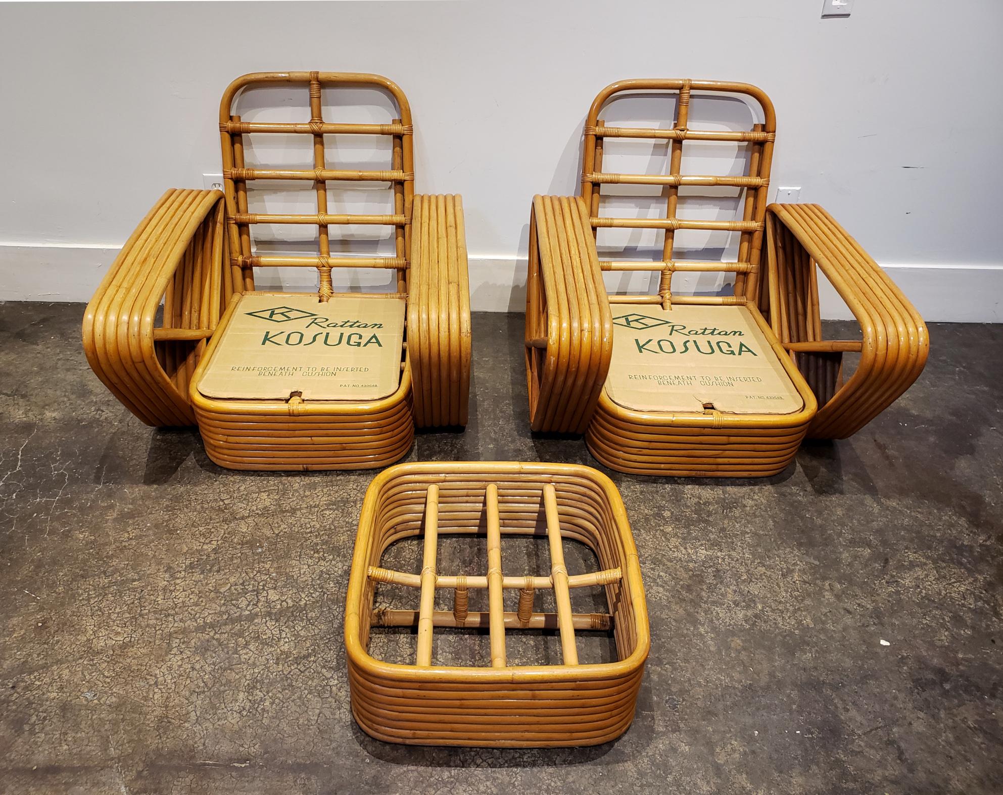 Quality vintage Paul Frankl style bent rattan armchairs made by Kosuga Japan in the 1950s. Two armchairs and one ottoman. Original cushions are gone. Wide open for your choice of cushion and upholstery.