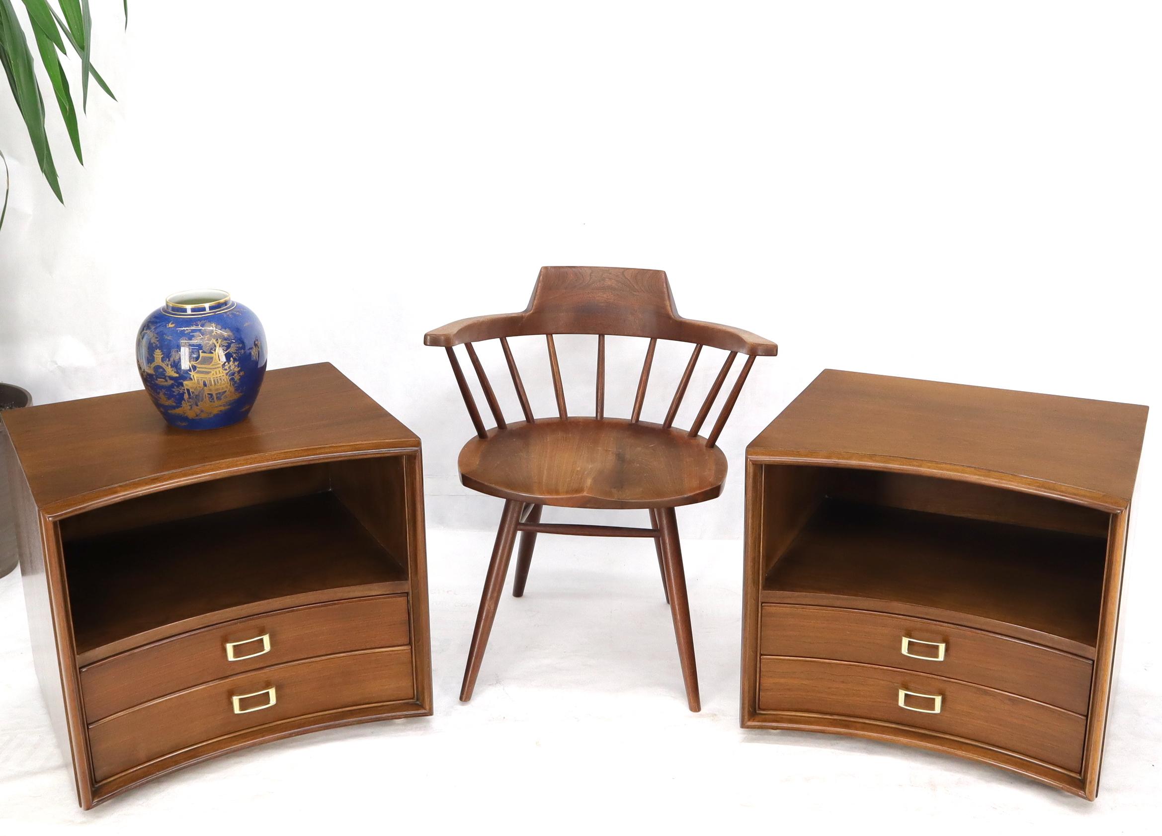 Pair of stunning Mid-Century Modern walnut end tables night stands with solid brass buckle shape pulls.