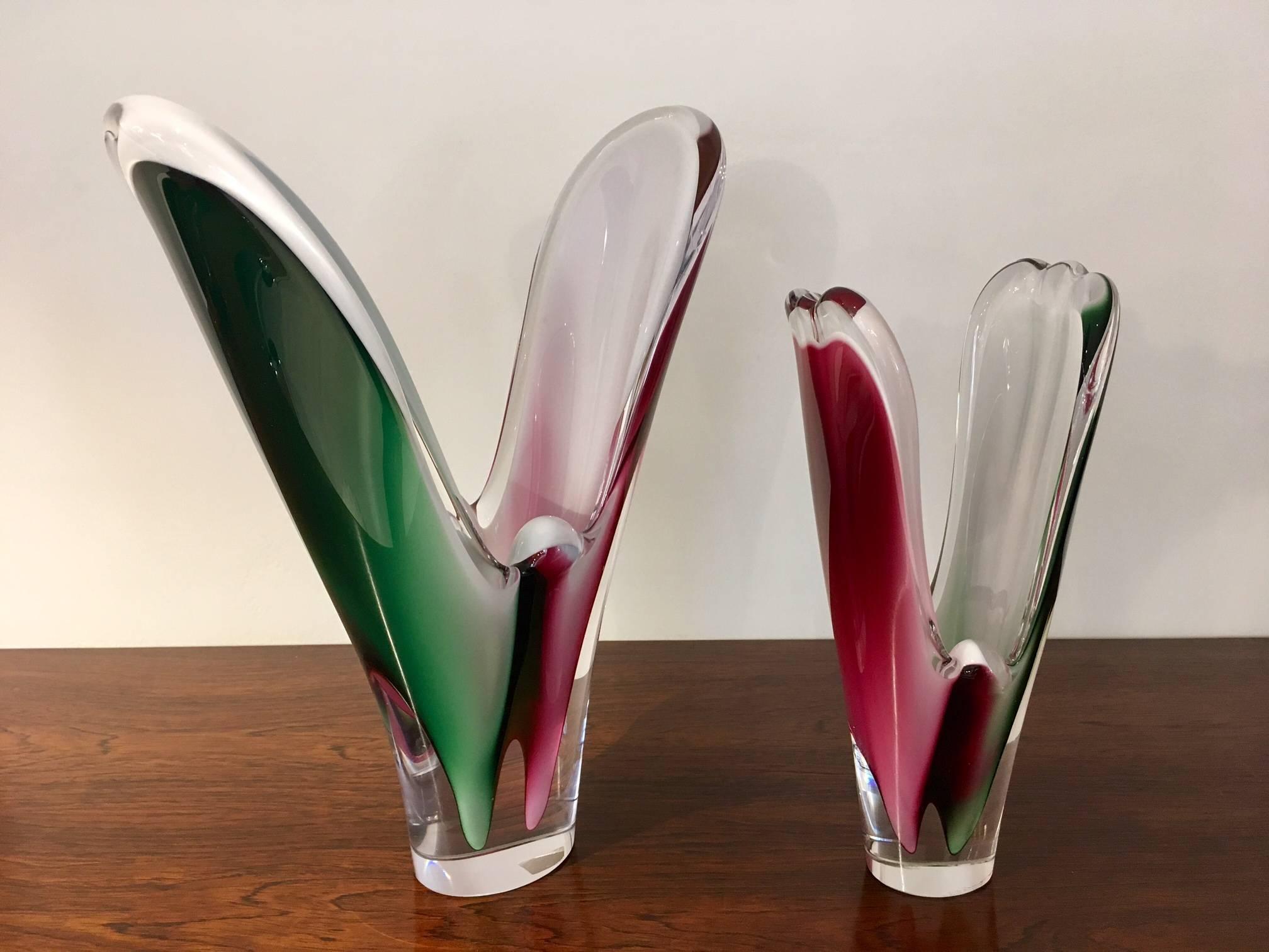 Pair of Coquille vases designed by Paul Kedelv and manufactured by Flygsfors Glassworks in Sweden. Marked, one vase signed Flygsfors Coquille. Tiny chip on the bigger vase, pictured.
Dimensions: Large - H 33 cm, W 25 cm, D 10 cm
Small - H 25 cm, W