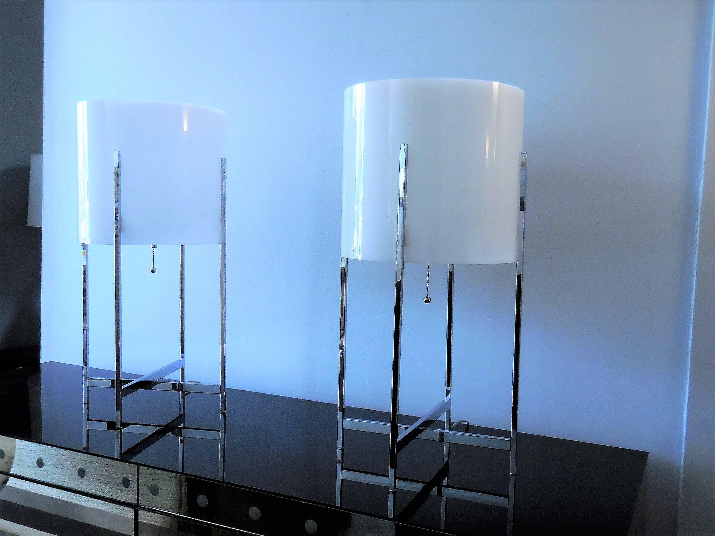 A pair of modern lamps by Paul Mayen. The frame is thin square chrome and the shade/diffuser is white acrylic. Modern Minimalist look from the 1970s.