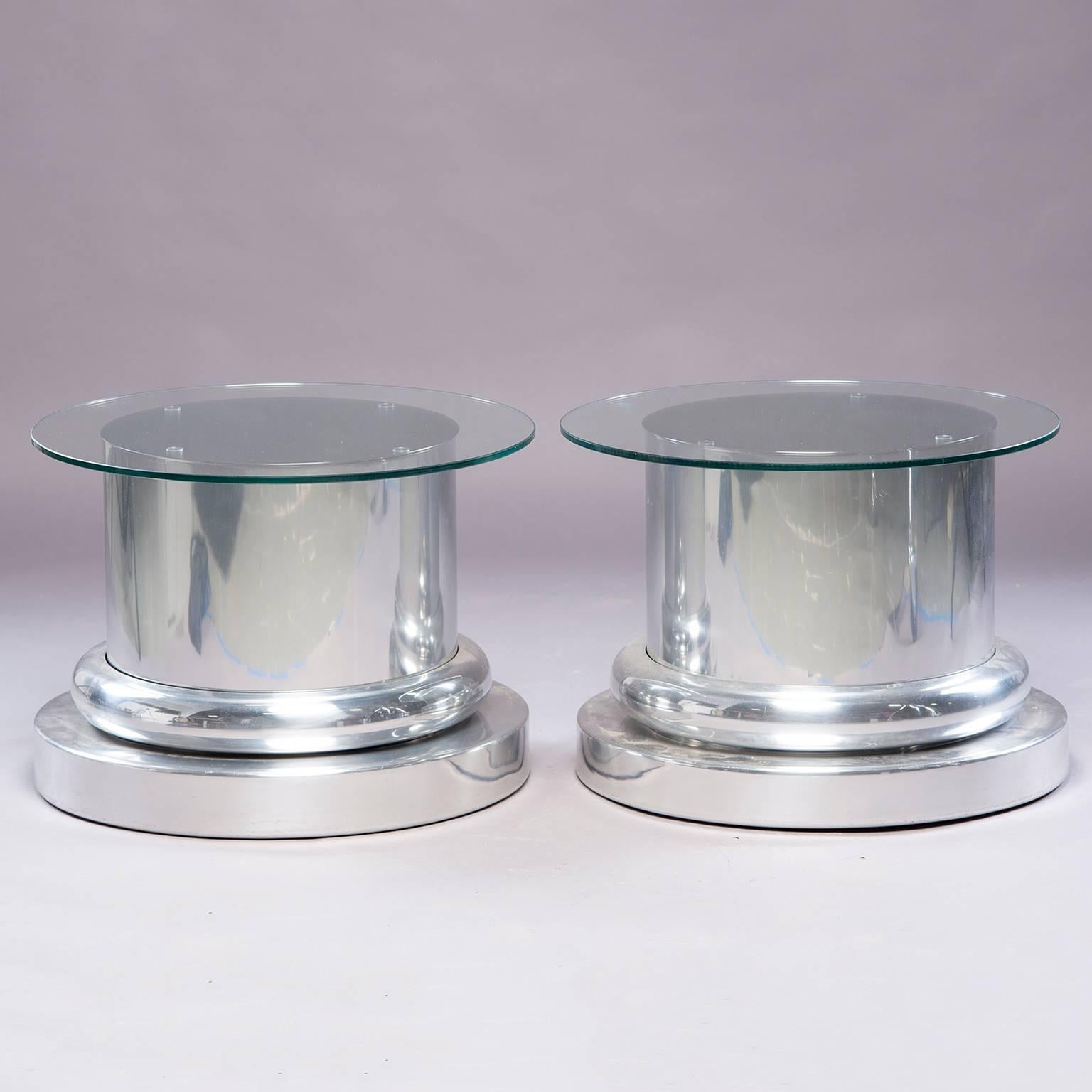 Pair of polished aluminium base side tables with glass tops attributed to Paul Mayen, circa 1970s. Glass is new. Aluminum bases have scattered surface scratches. Sold and priced as a pair.