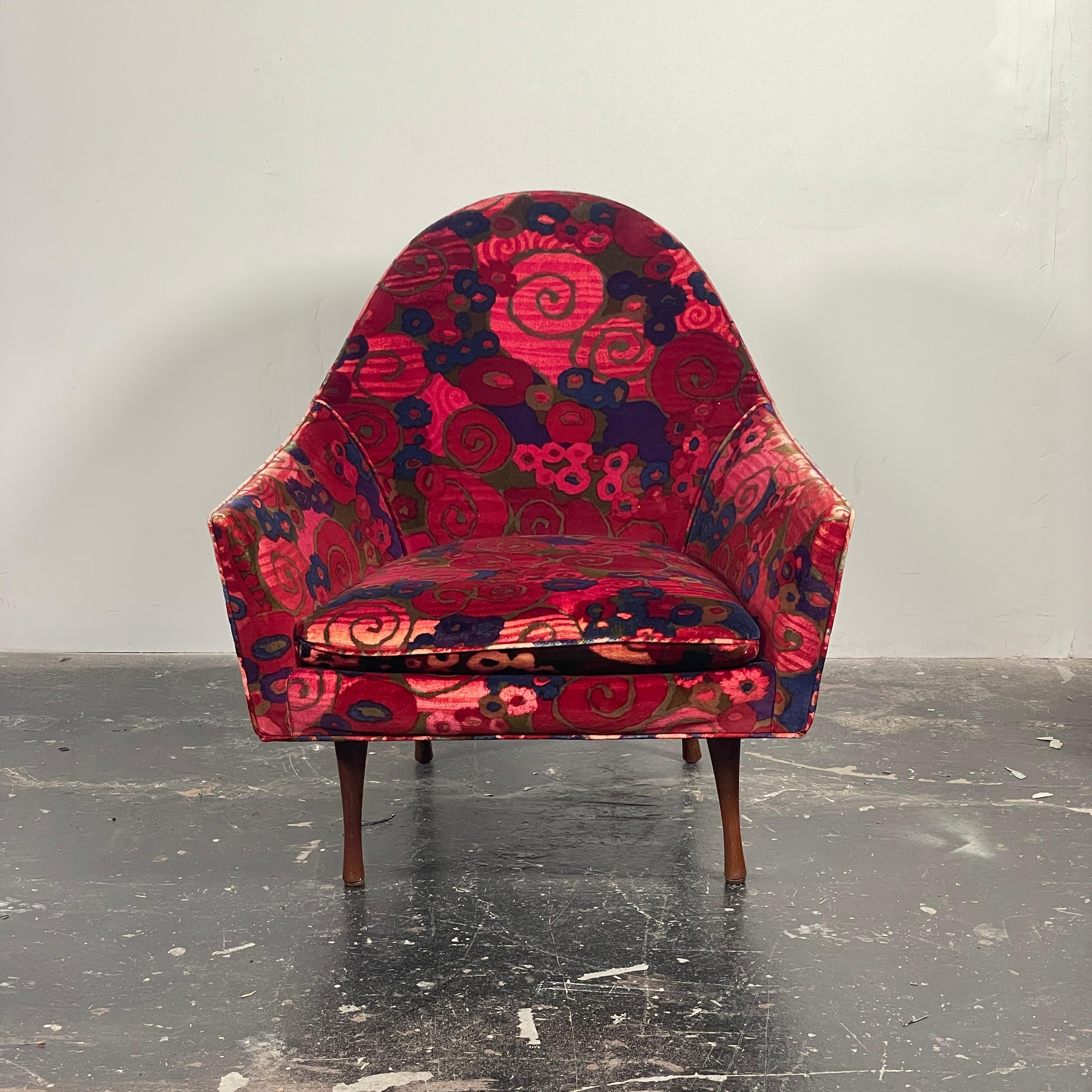 Pair of Paul McCobb Lounge chairs in what we believe is original Jack Lenor Larsen fabric. We will be restoring the walnut legs and, if you choose, we can reupholster. But, we LOVE the fabric which is in good to great vintage condition. There are no