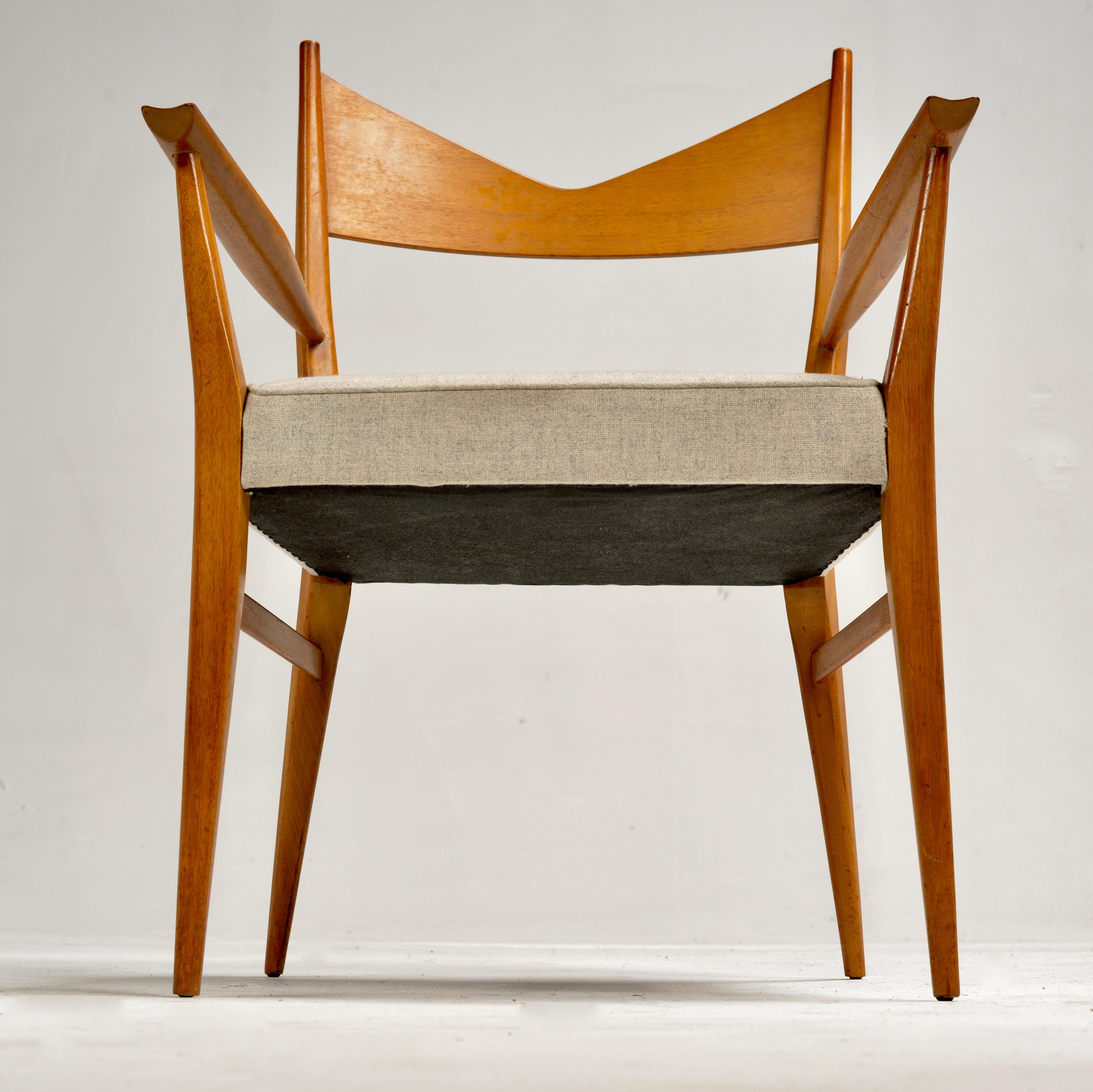 Mid-Century Modern bowtie dining chair By Paul McCobb for Directional and produced by Calvin Furniture, USA, 1950s Elegant sculpted mahogany frames, with vintage upholstered seat. We have two armchairs available and can be sold separately. 