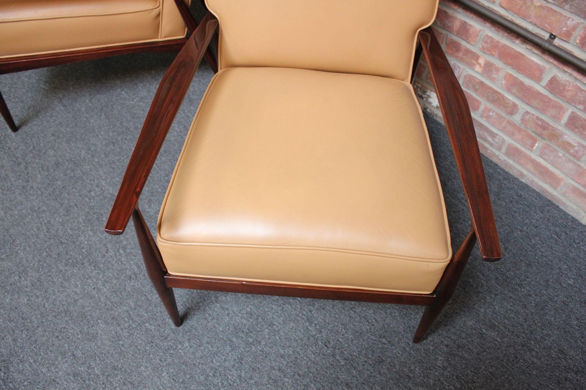 Naugahyde Pair of Paul Mccobb Stained Maple Lounge Chairs For Sale
