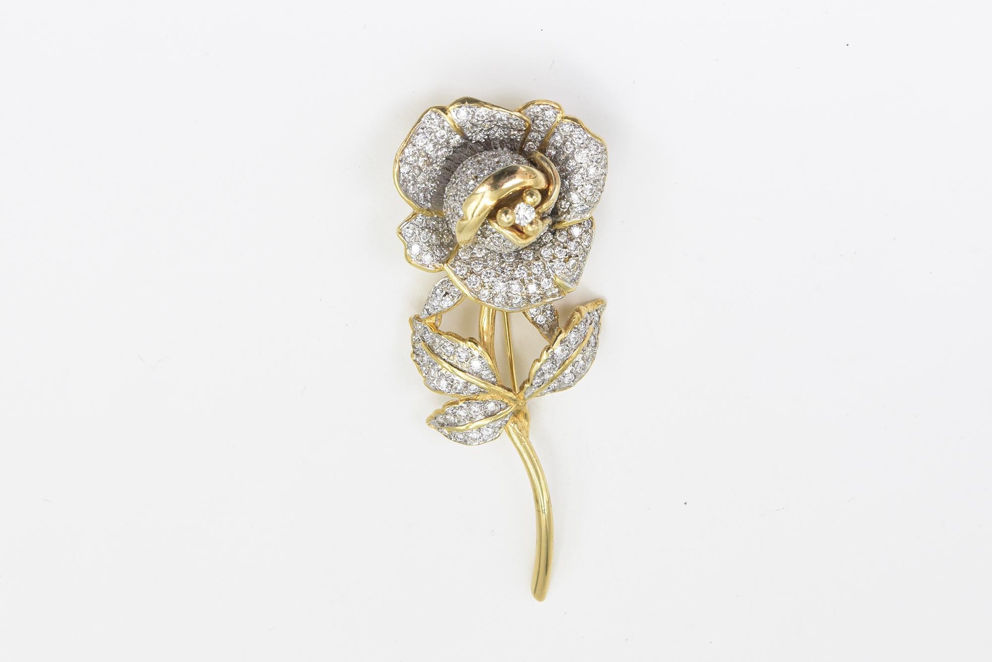 We have 2 of these beautiful custom made pave diamond rose brooches.  They can be purchased as a pair or individually.  They are 14k yellow gold with 4.58 carats of diamonds in each one.  Price listed below is for the pair, but they can also be