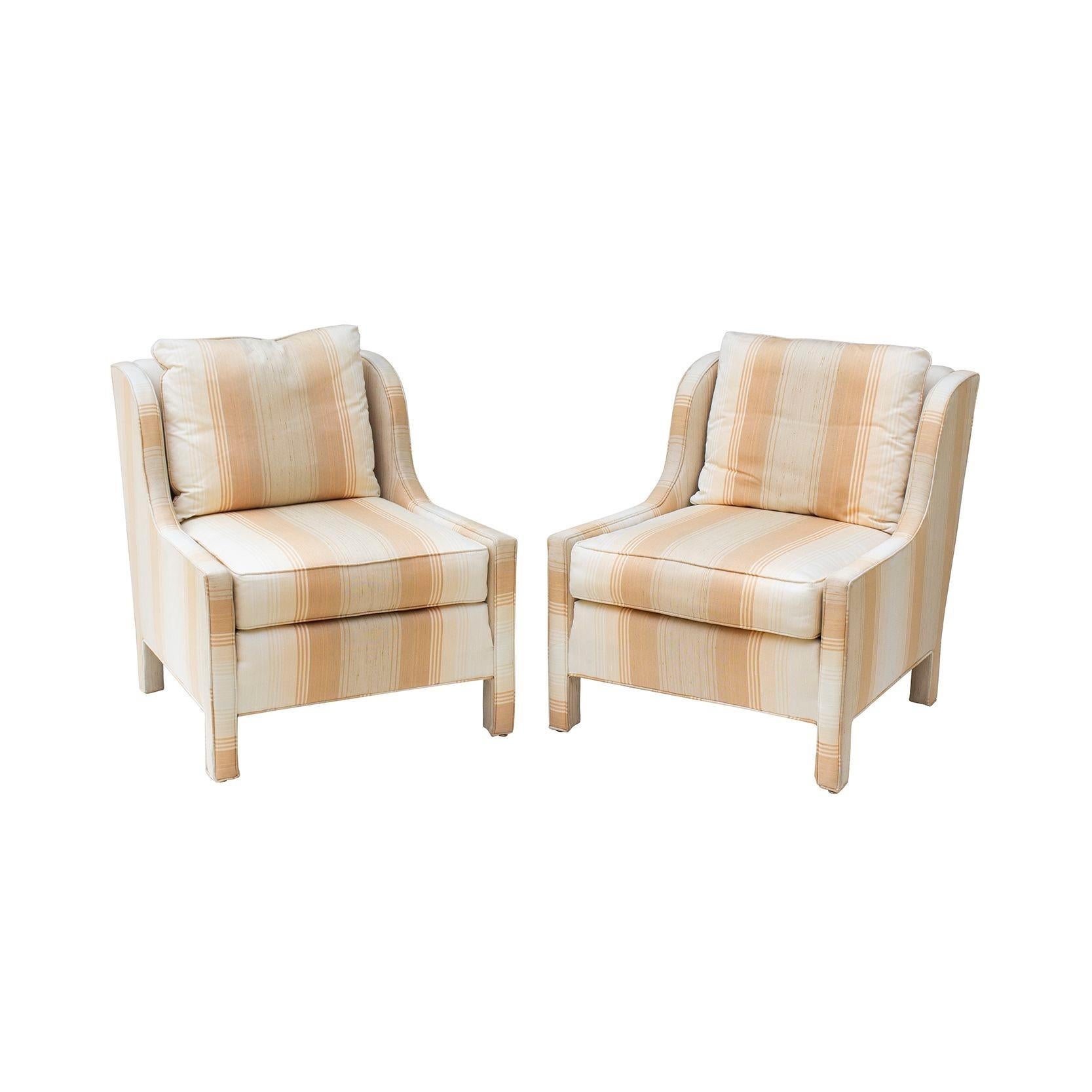 USA, 1980s
Pair of peach striped parsons style slipper chairs with curving arms. The brand is Hickory Tavern by Lane. A nice contemporary blend of a parsons chair and a wing chair. Upholstery is in very good condition as is but the frames are very