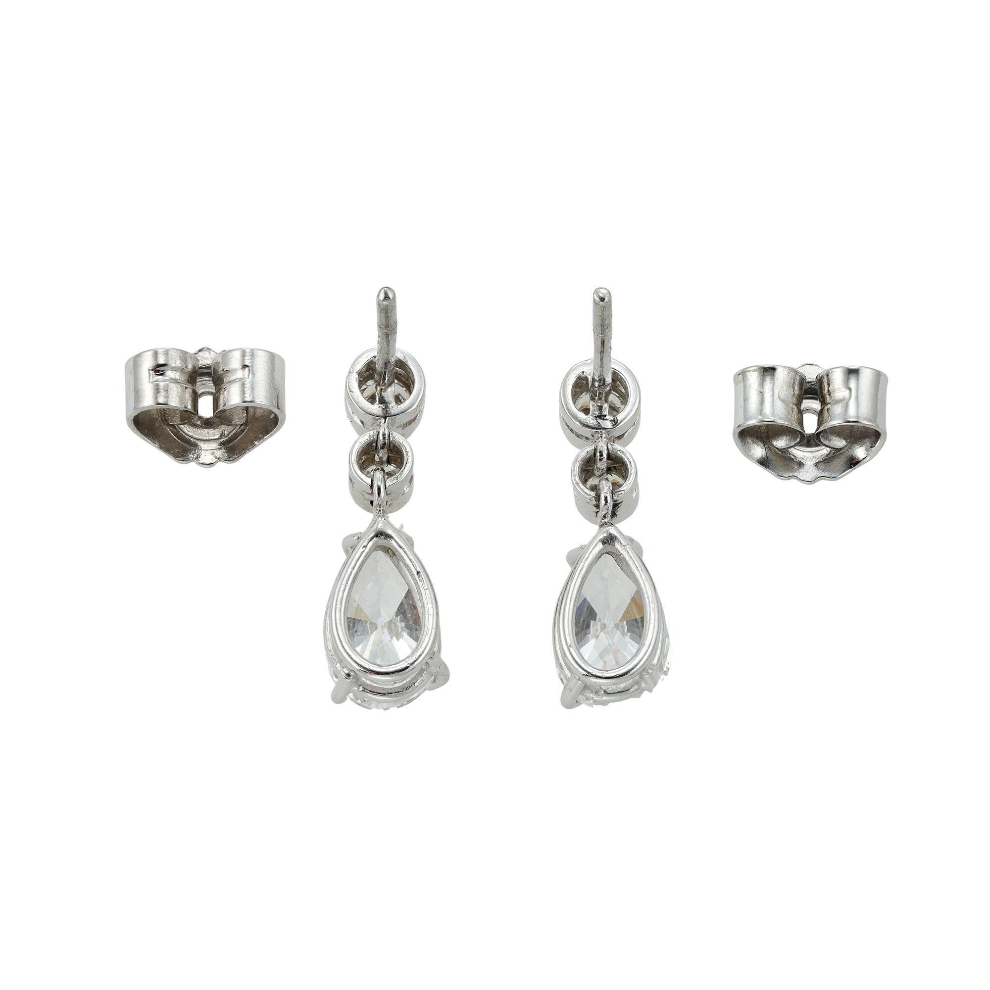 Contemporary Pair of Pear Shaped Diamond Drop Earrings