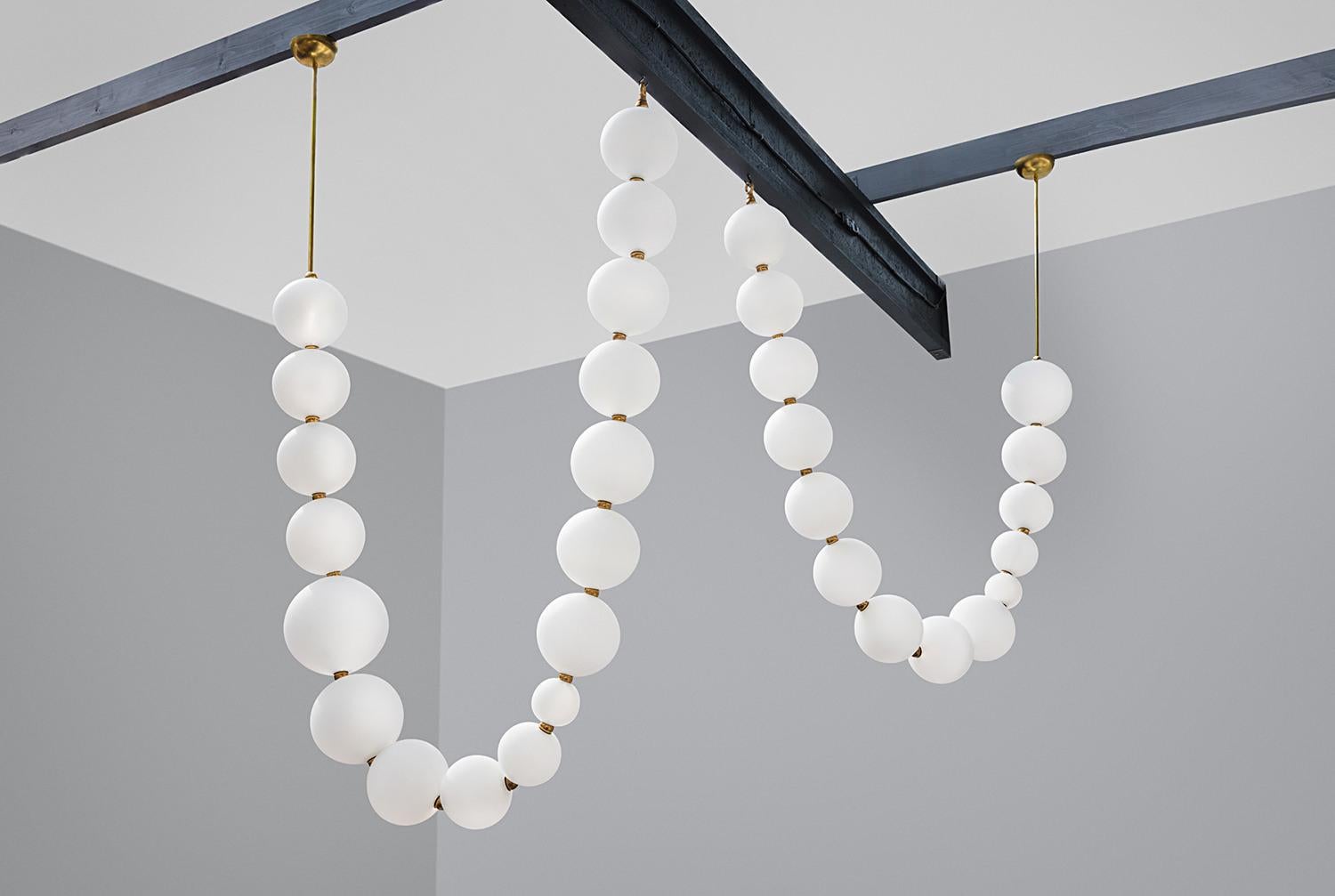 Pair of pearl necklace pendant lights - Ludovic Clément d’Armont
Every creation of Ludovic Clément d’Armont can be made to order in any requested dimensions. Please contact us for custom-made creations.
Blown glass and brass
Dimensions of the