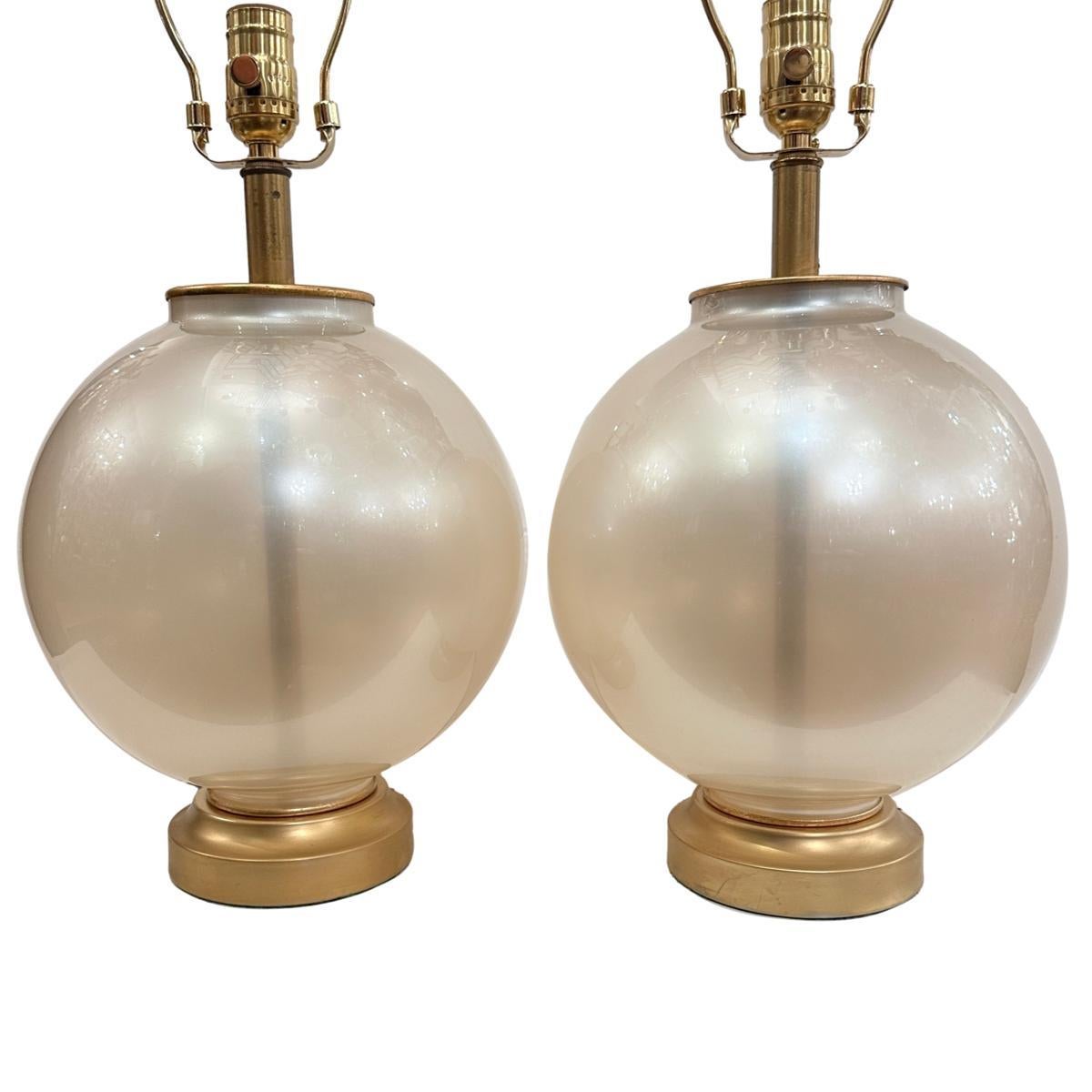 Pair of circa 1950's French pearl glass lamps.

Measurements:
Height of body: 13