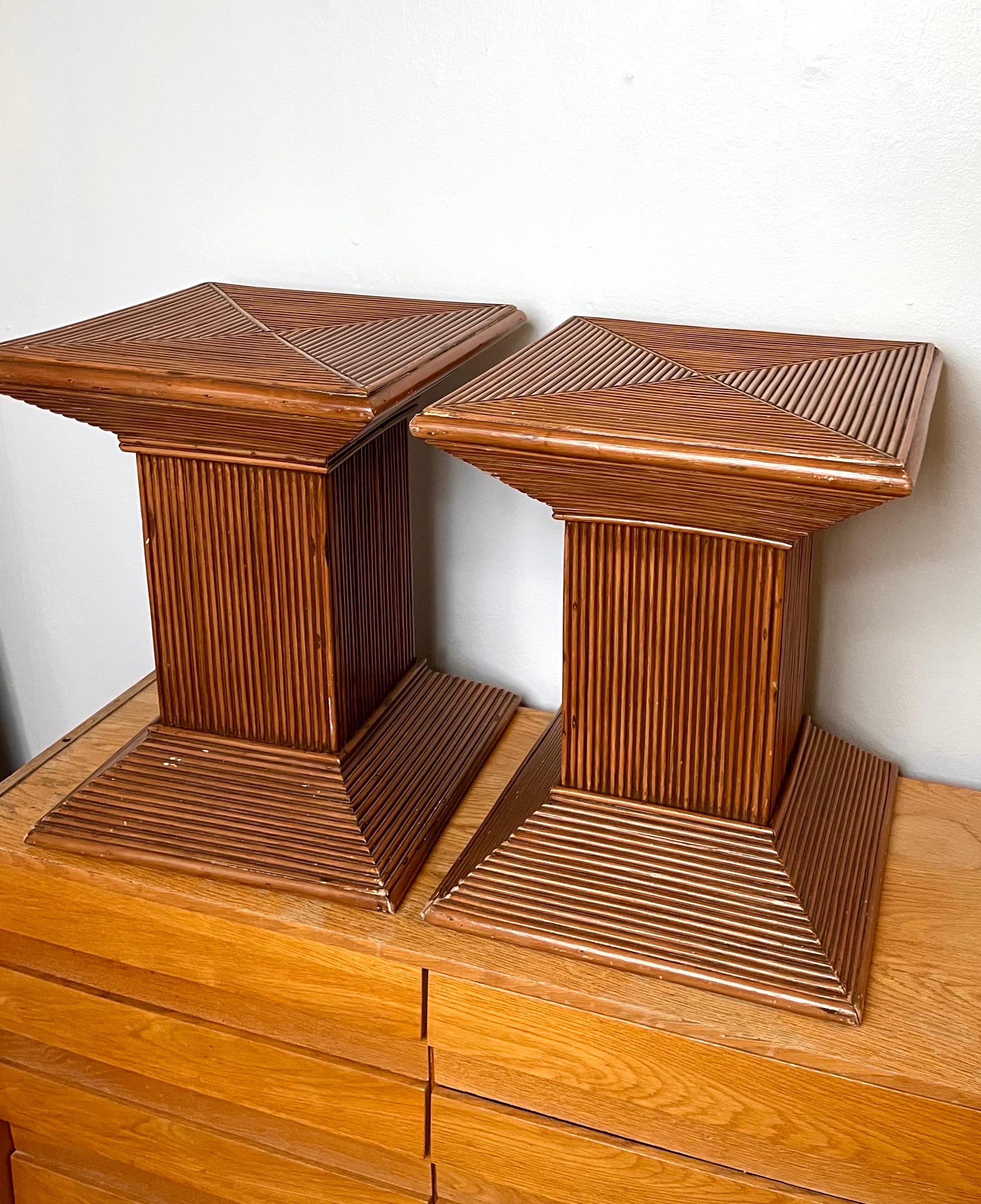 Pair of Pencil Reed Rattan Bamboo Side Tables/ Pedestals

Elevate your decor with this charming pair of vintage bamboo side tables/pedestals, reminiscent of the style of Vivai del Sud. Crafted with bamboo and rattan, these tables exude a timeless