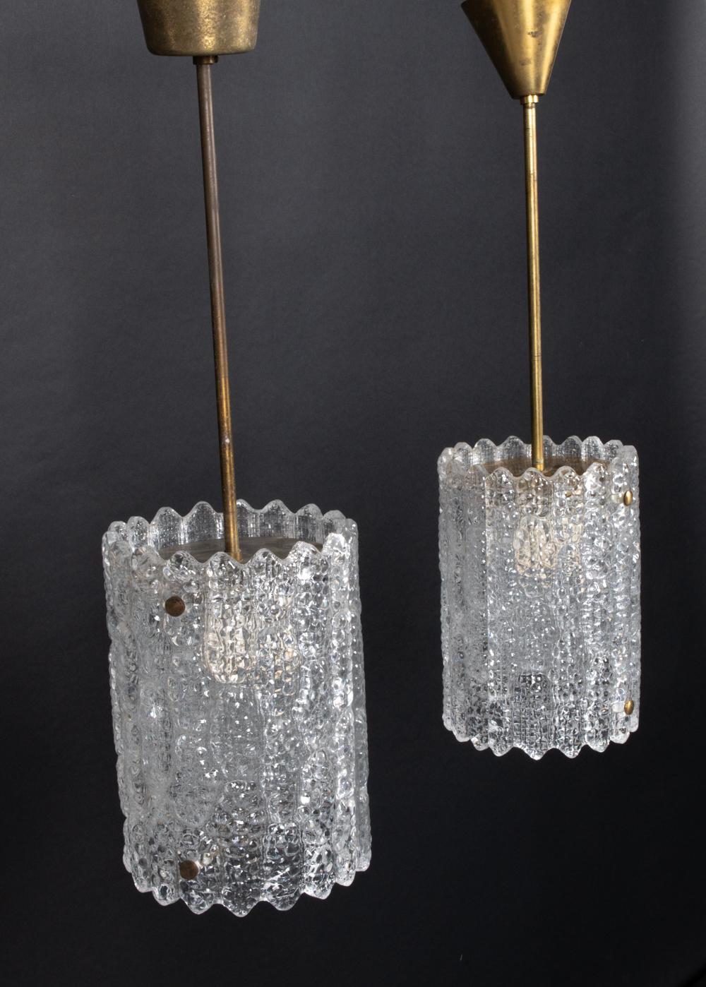 Brass Pair of Pendant Lamps by Carl Fagerlund for Orrefors For Sale