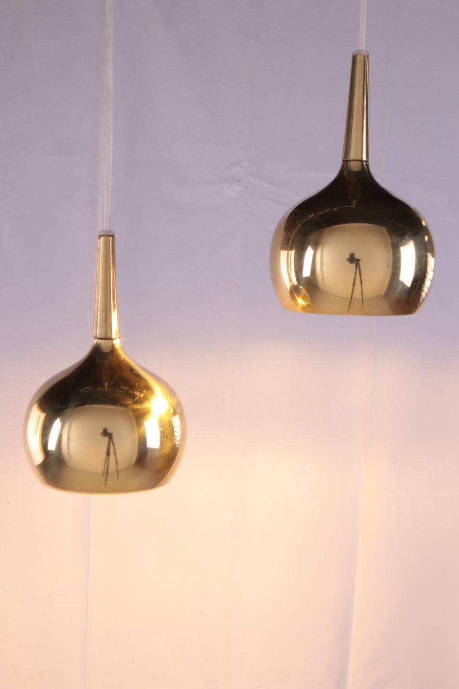 Pair of Pendant Lamps by Hans-agne Jakobsson for Markaryd AB, 60s

Hanging lamp set by Hans-Agne Jakobsson for Markaryd AB, 60s

A brass hanging lamp set by the famous Swedish designer Hans-Agne Jakobsson for the lamp brand Markaryd AB in the