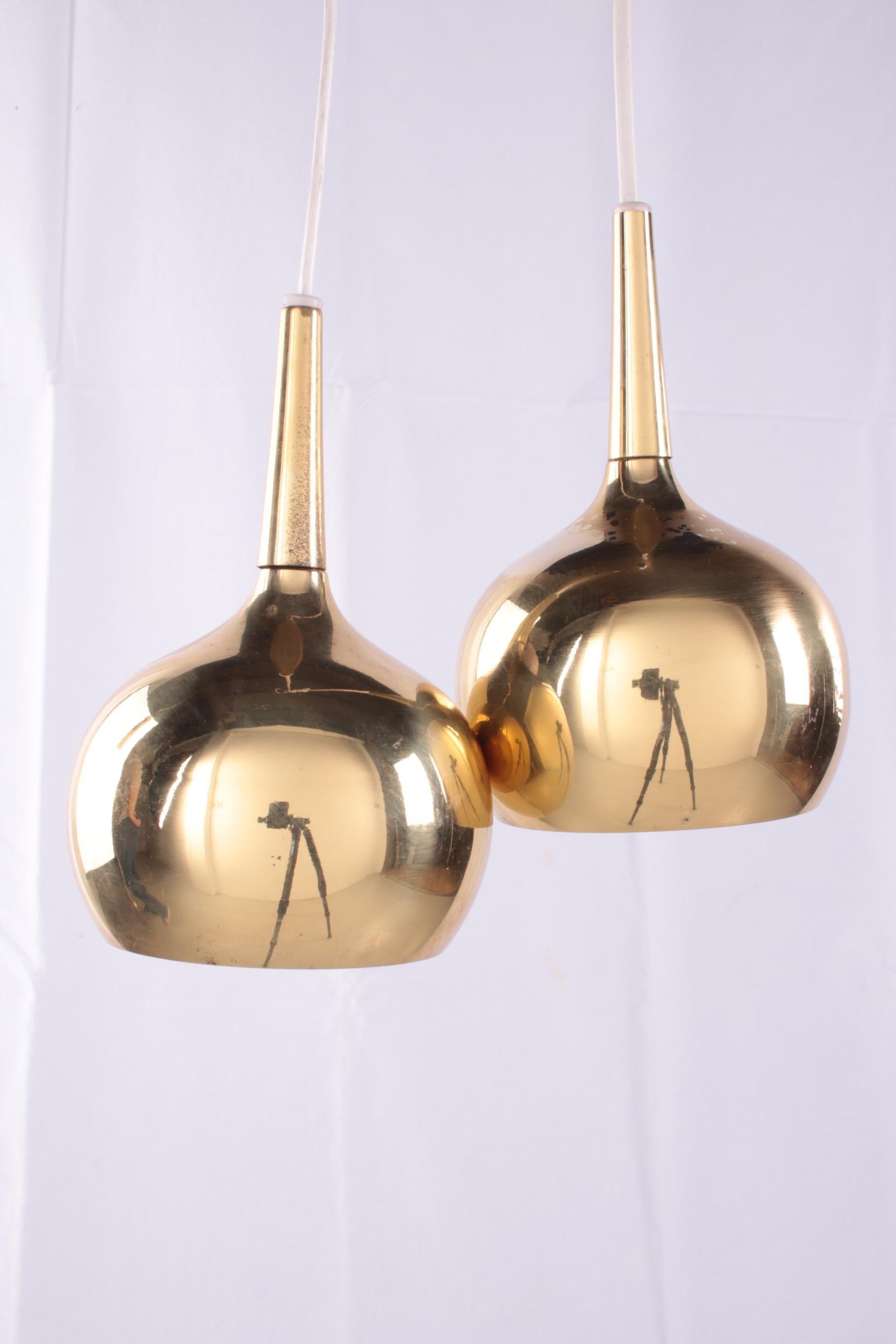 Pair of Pendant Lamps by Hans-agne Jakobsson for Markaryd AB, 60s

Hanging lamp set by Hans-Agne Jakobsson for Markaryd AB, 60s

A brass hanging lamp set by the famous Swedish designer Hans-Agne Jakobsson for the lamp brand Markaryd AB in the